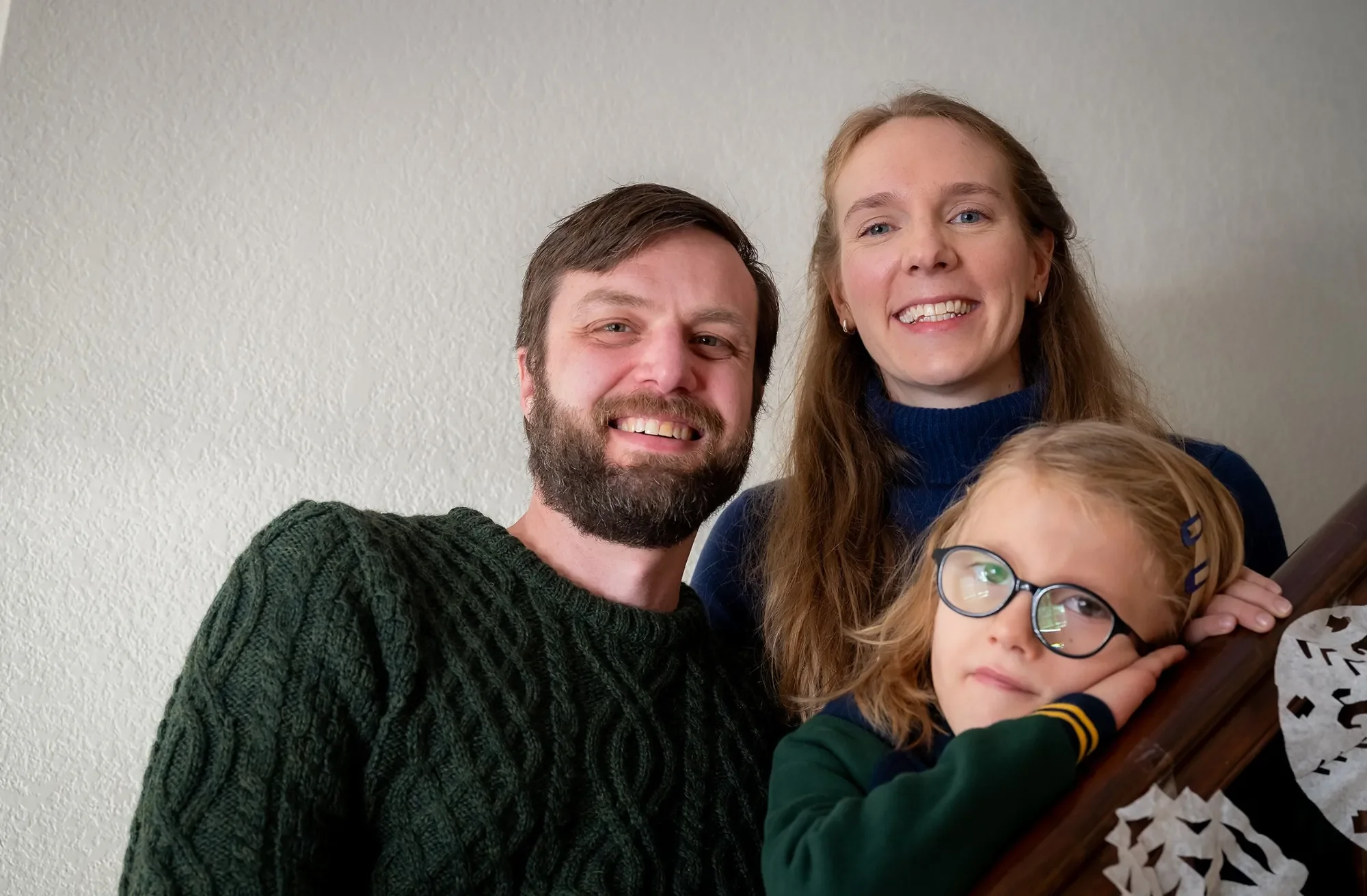 Family portrait at vacation rental home in Fraser, Colorado captured by Ryan Kost.
