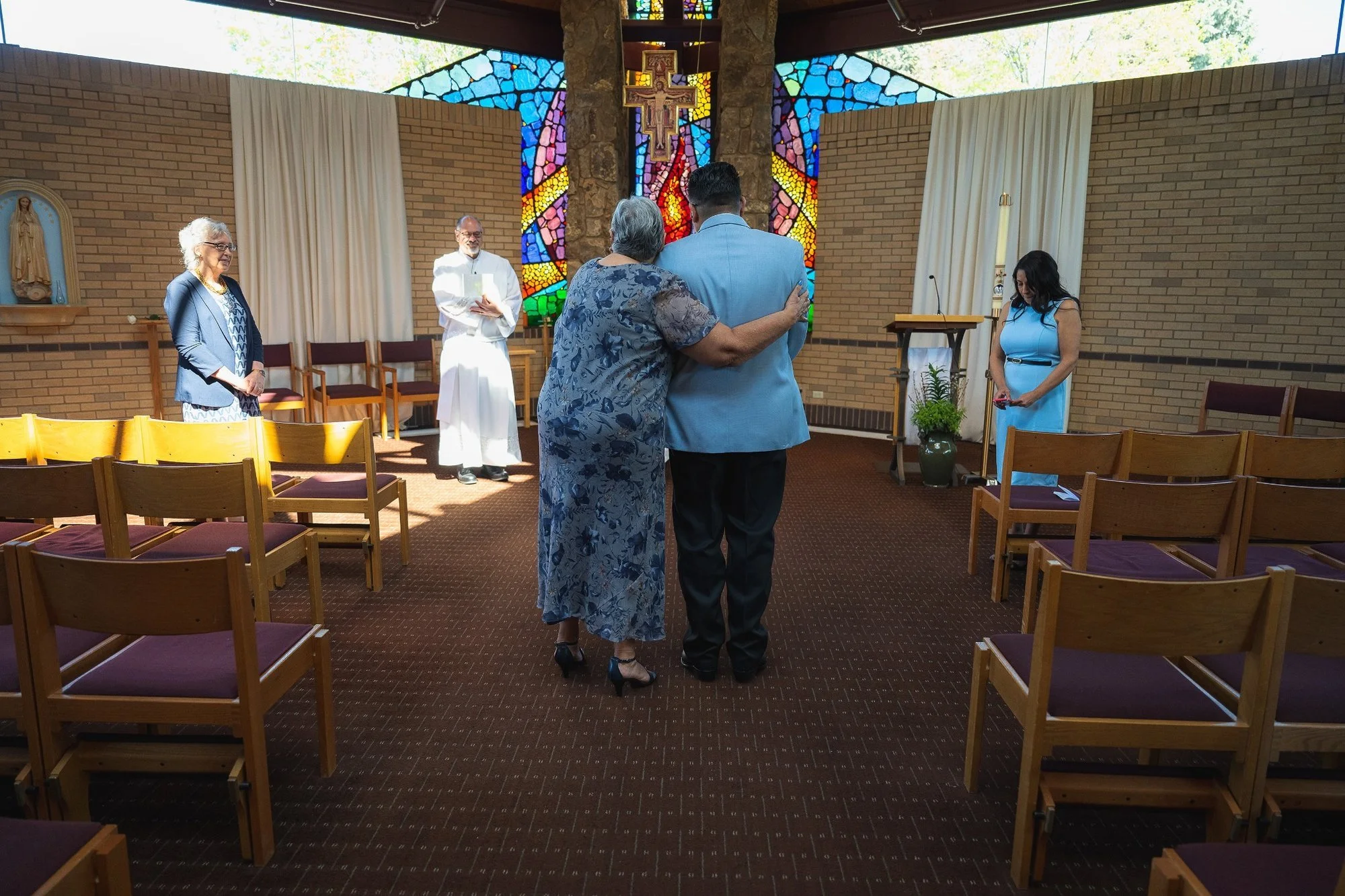 Artful storytelling through the lens—intimate elopement portraits from Spirit of Christ Church in Arvada with a beautiful balance of drama and love by Ryan Kost.