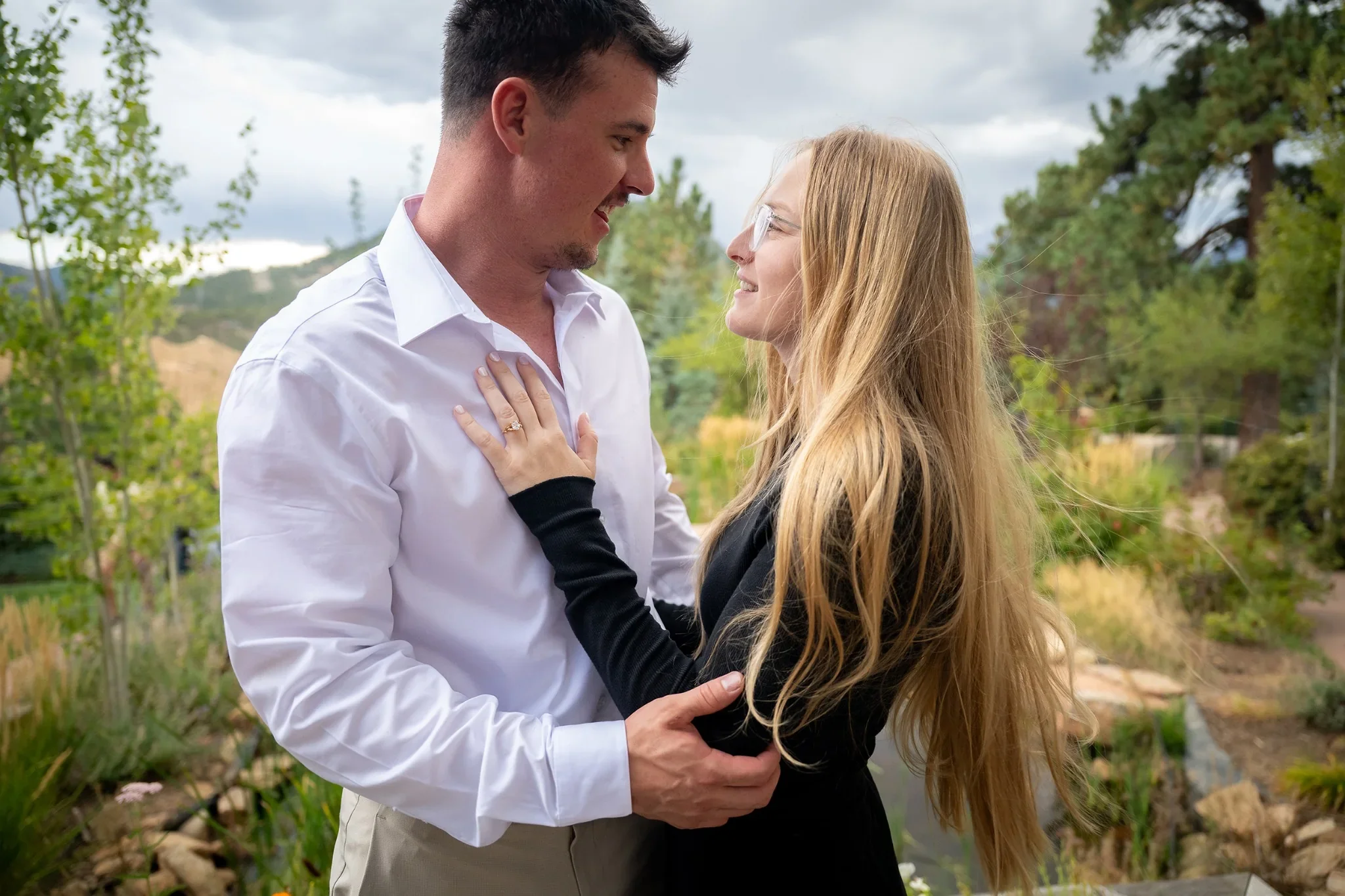Romantic engagement portrait in the mountain setting surrounding the Stanley Hotel in Estes Park