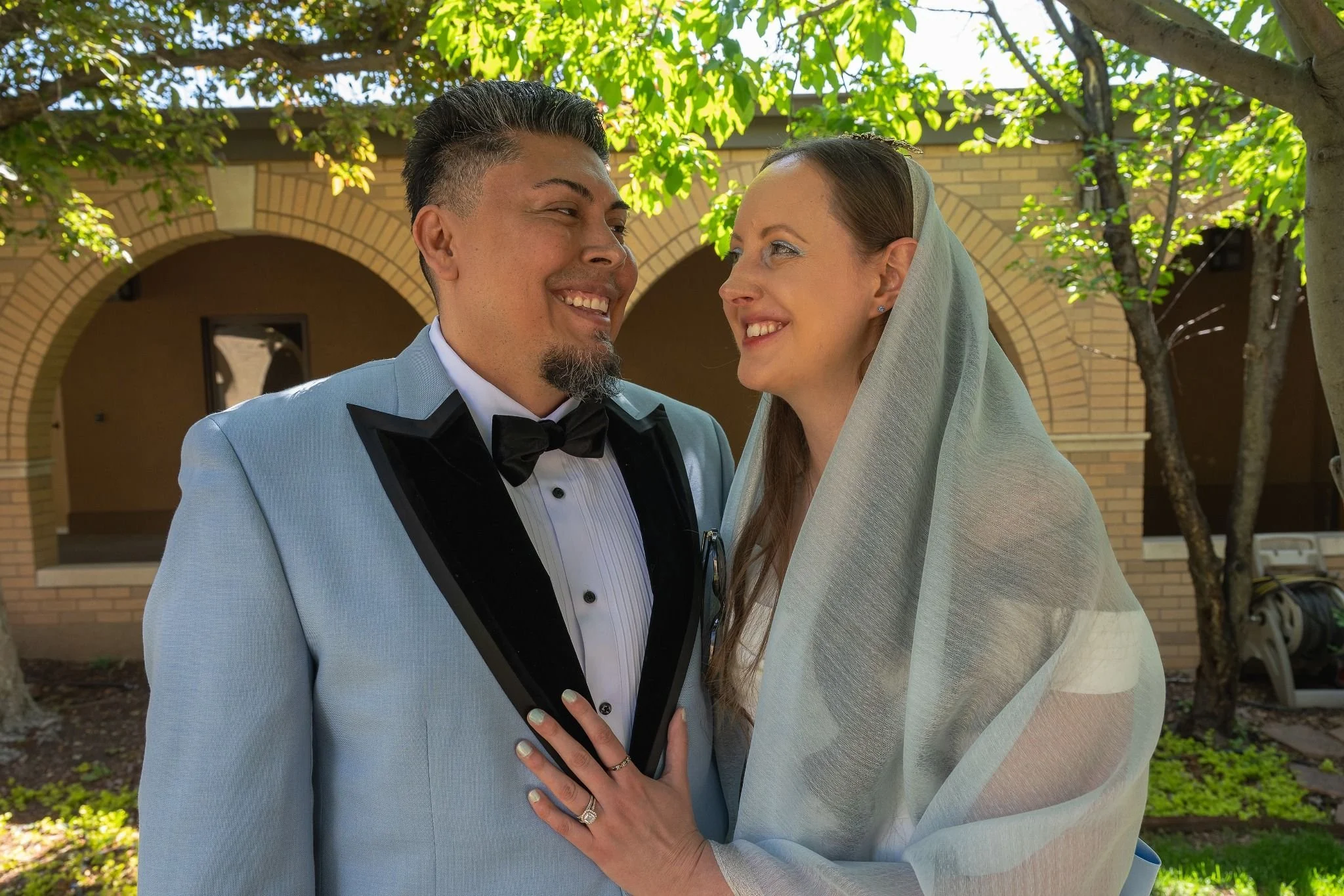 Loving eyes. Timeless elopement moments in Arvada, Colorado—moody chapel light and cinematic emotion captured by Colorado elopement photographer Ryan Kost.