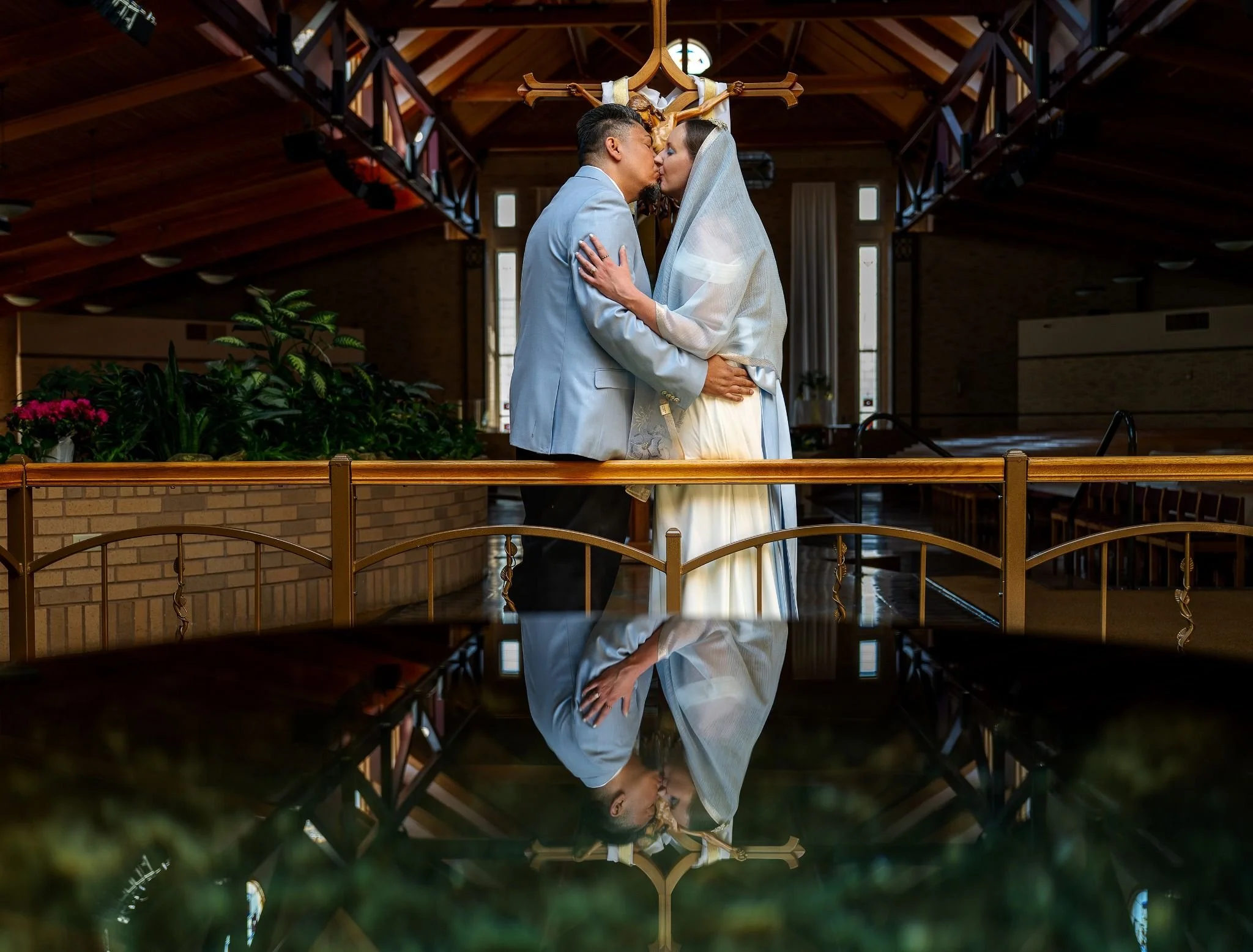 Intimate wedding ceremony at Spirit of Christ Church in Arvada, Colorado, captured with cinematic lighting and natural emotion by elopement photographer Ryan Kost.