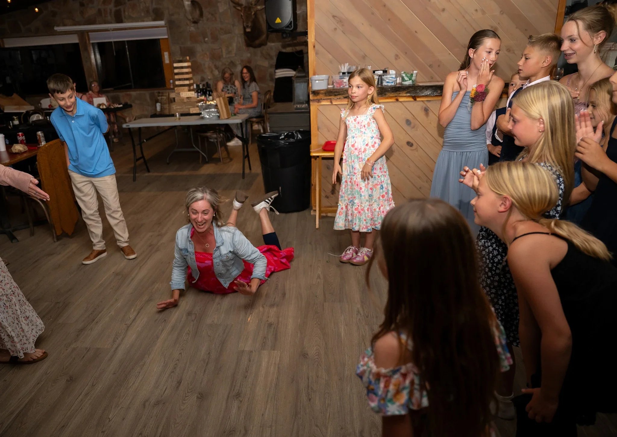 Doing the worm during dance off at wedding reception at Red Bear Haus in Horca, Colorado.