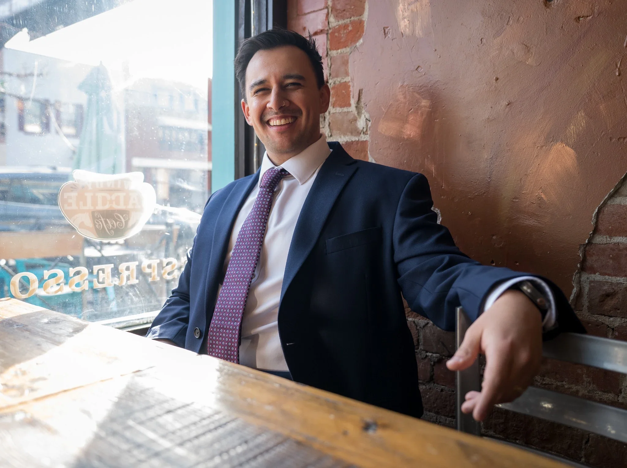 Relaxed, professional portrait headshot photography at Windy Saddle Cafe in downtown Golden, Colorado.