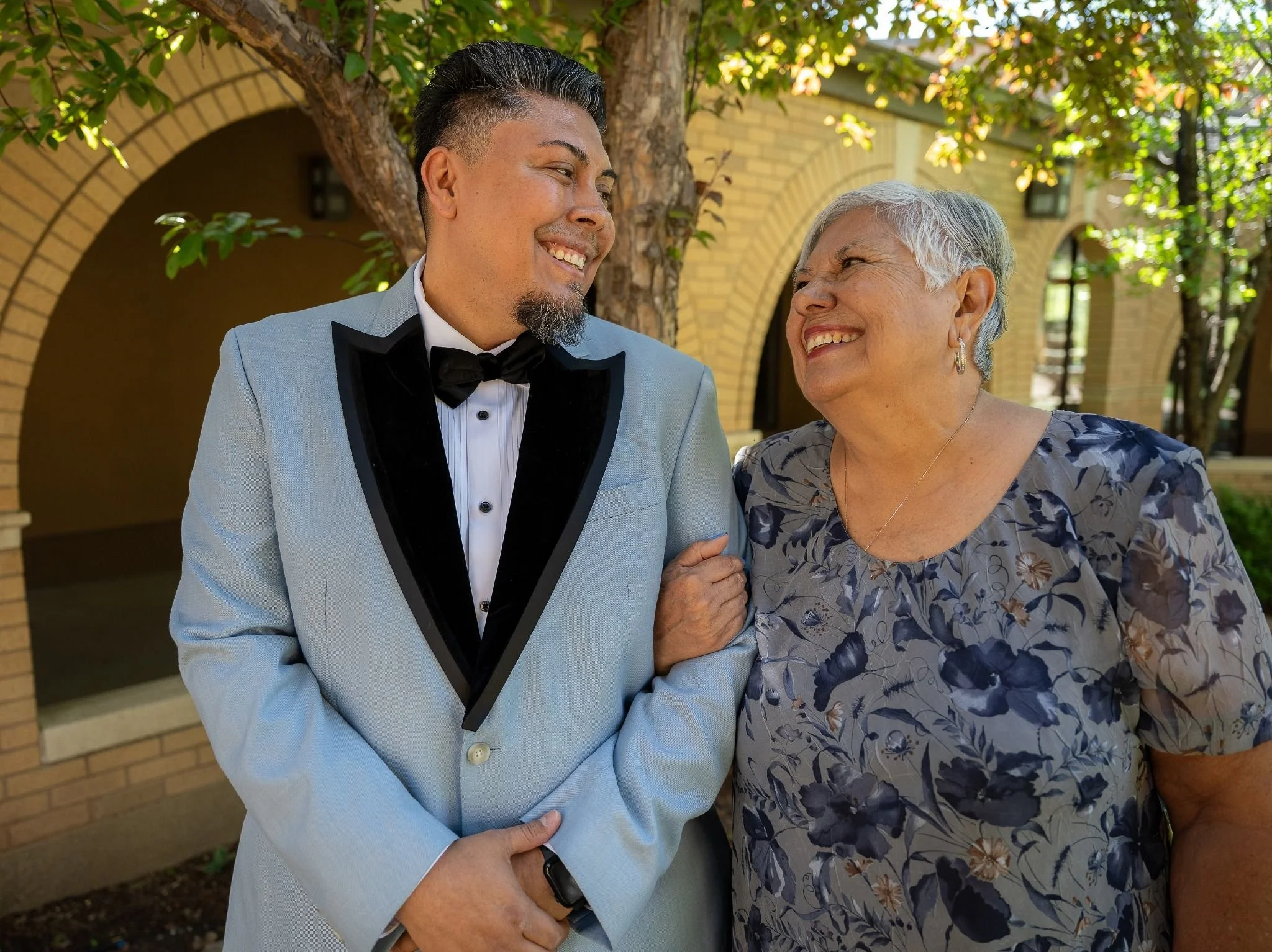 Joyful aunt and groom. Timeless elopement moments in Arvada, Colorado—moody chapel light and cinematic emotion captured by Colorado elopement photographer Ryan Kost.