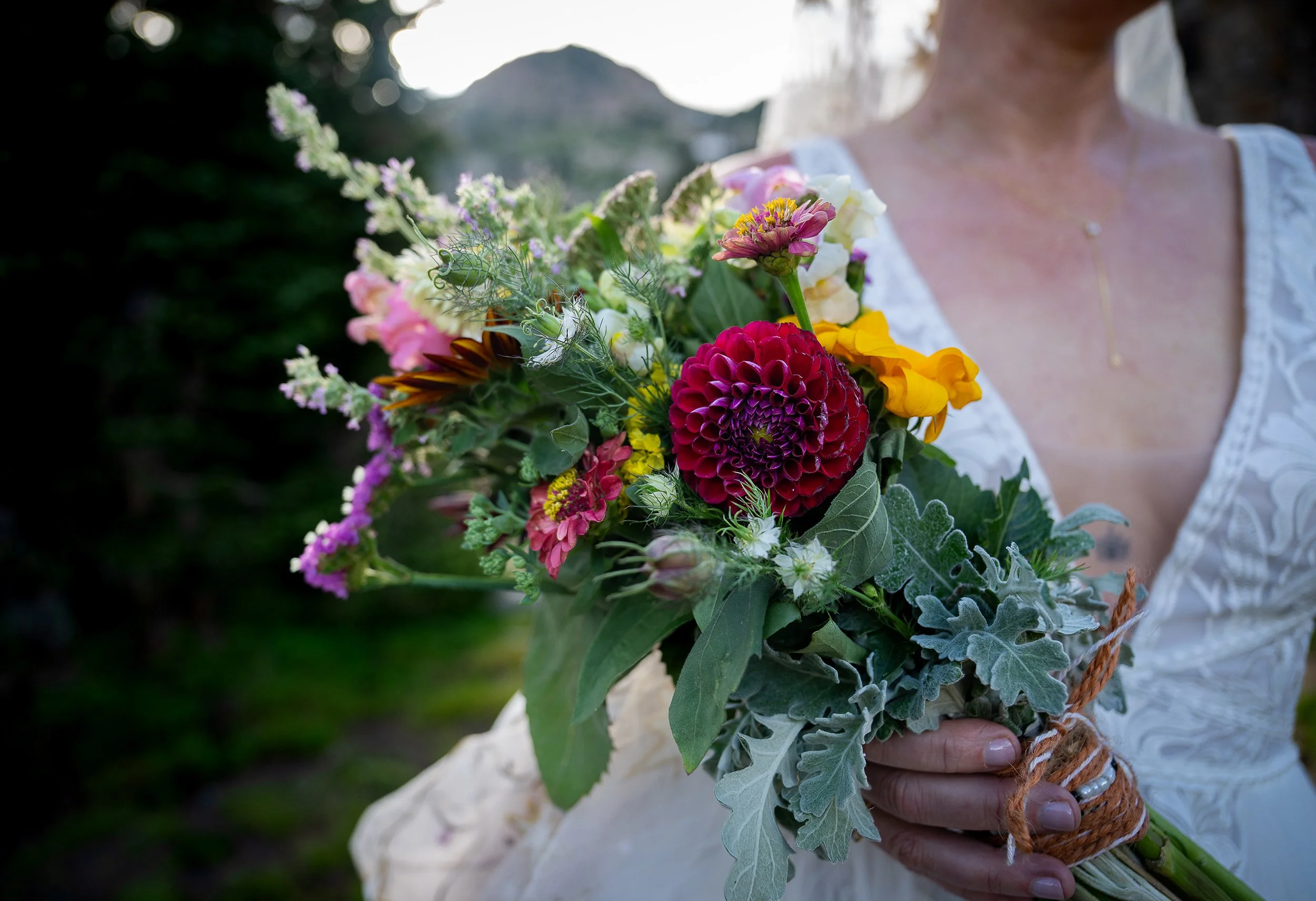 A wildflower-inspired elopement bouquet for a summer wedding at Lake Isabelle in the Colorado high country.