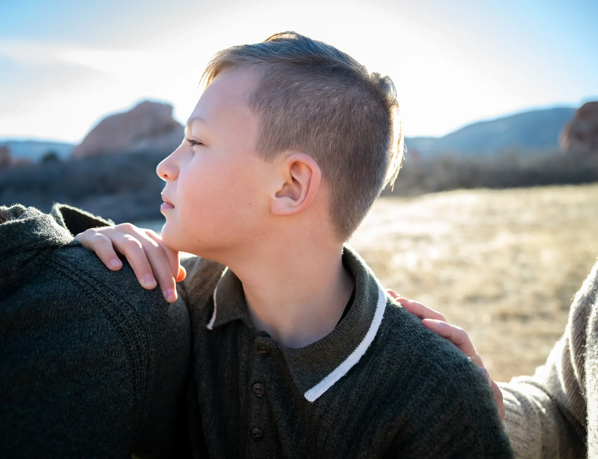 Tender quiet portrait during an outdoor family photography session at South Valley Park Littleton Colorado.