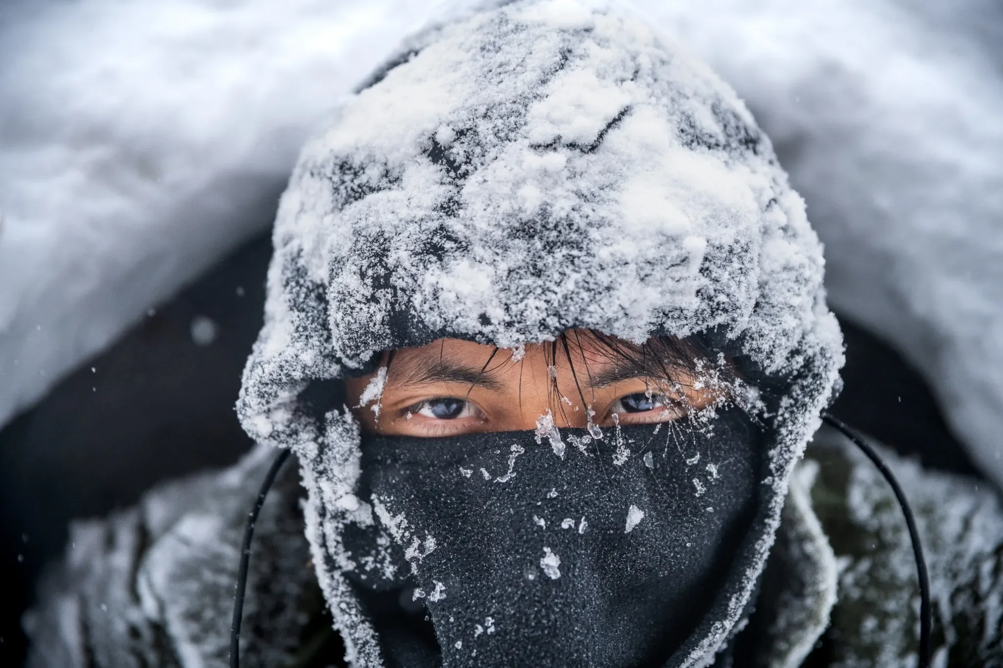 Snowy winter Arvada, Colorado family portrait photography captured by Ryan Kost