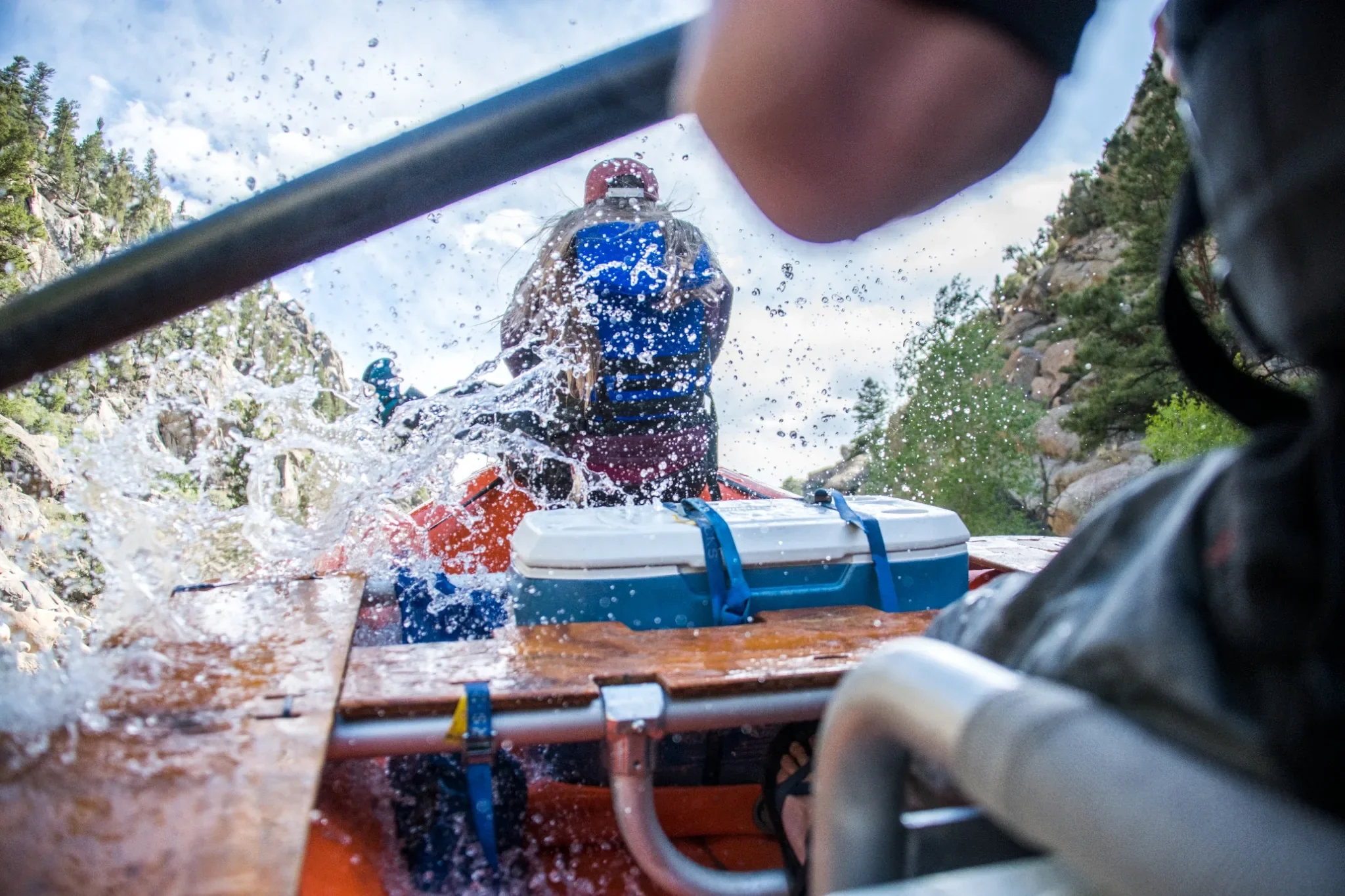 Whitewater rafting adventure with Aspire Tours in the Colorado mountains, captured for outdoor brand and marketing photography highlighting adventure, teamwork, and authentic experiences.