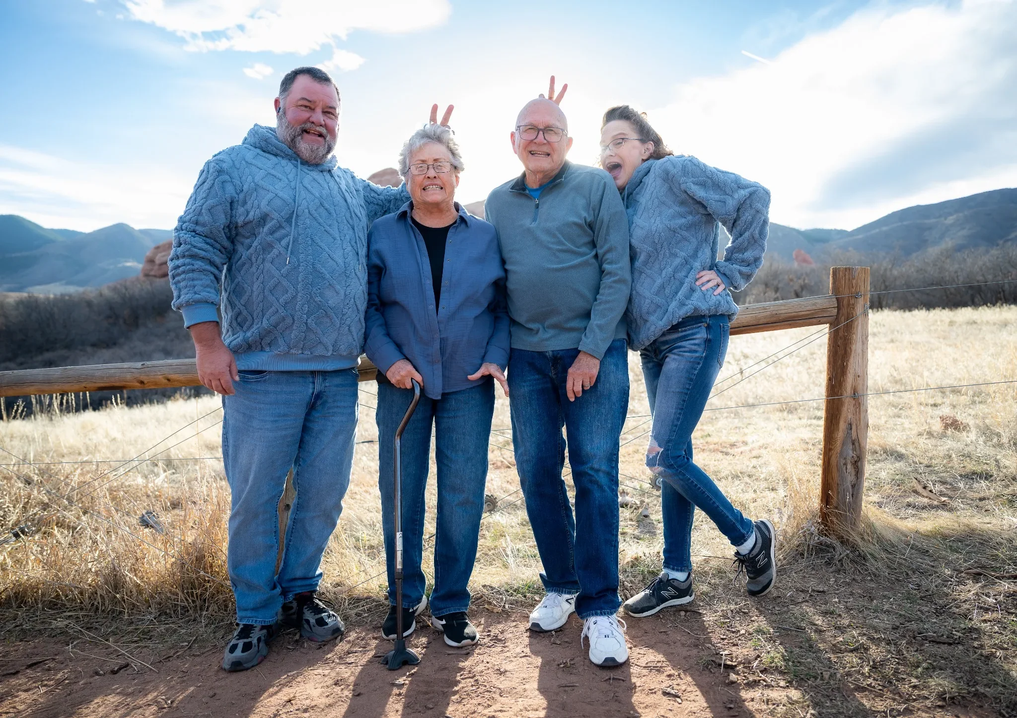 Playful candid moment with parents during a relaxed family photography session at South Valley Park. Ryan Kost Photography