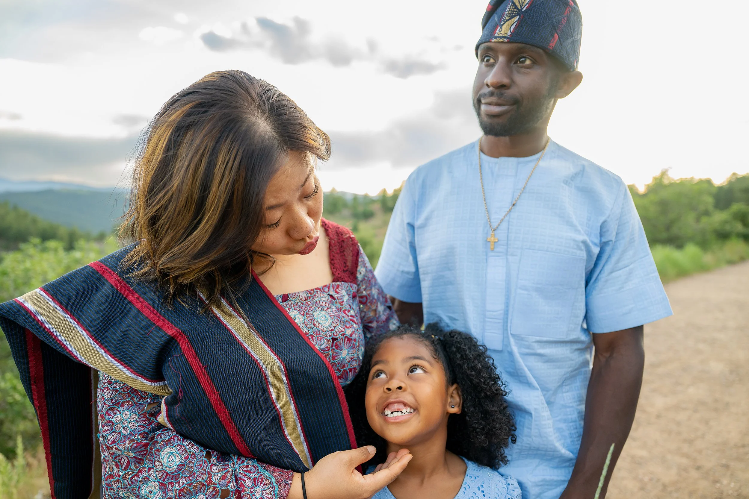 Loving looks and tender genuine family moments at Mount Falcon West captured by Denver family photographer Ryan Kost