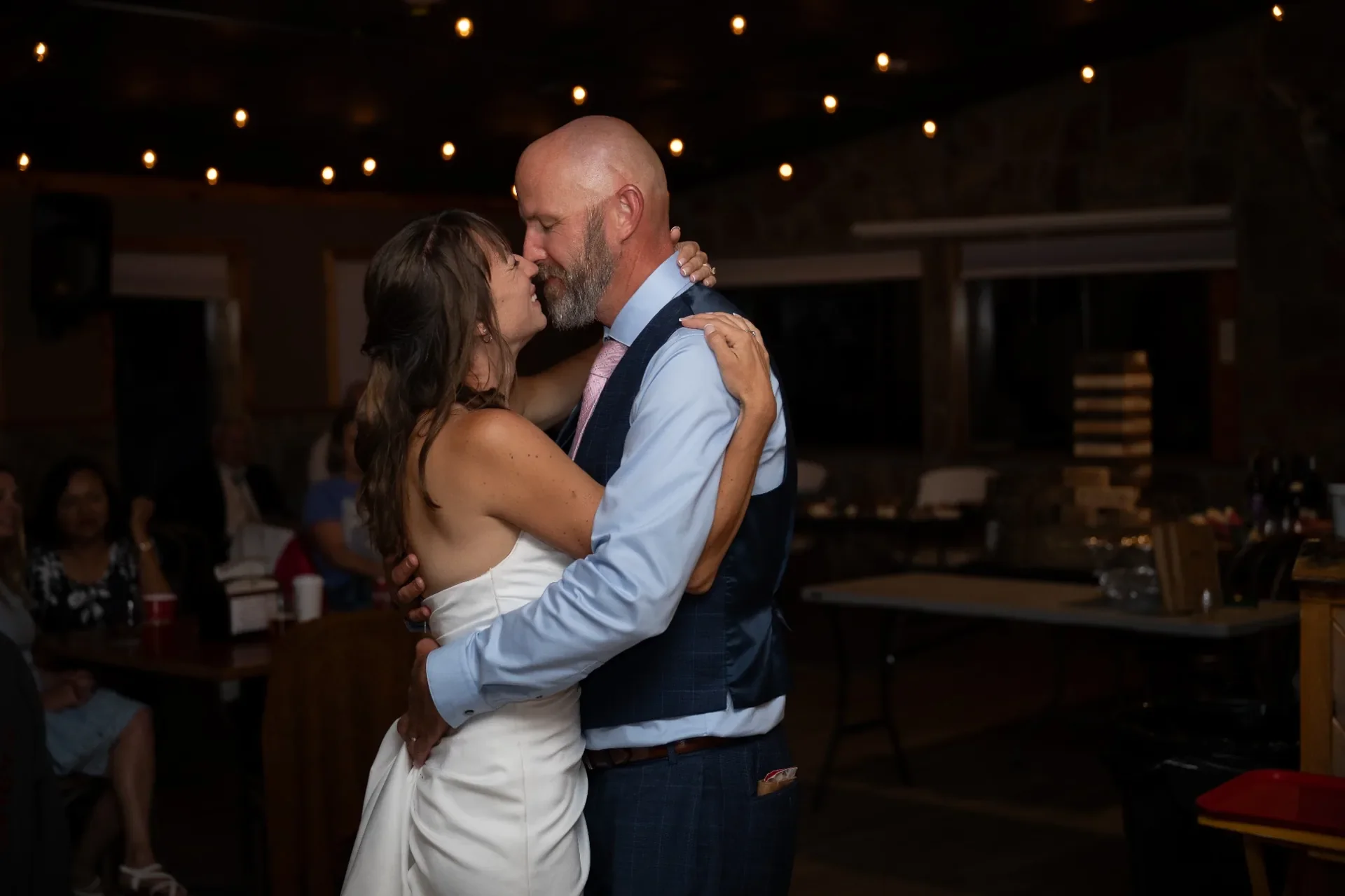 Bride and groom sharing their first dance during an intimate wedding reception in Horca, Colorado.