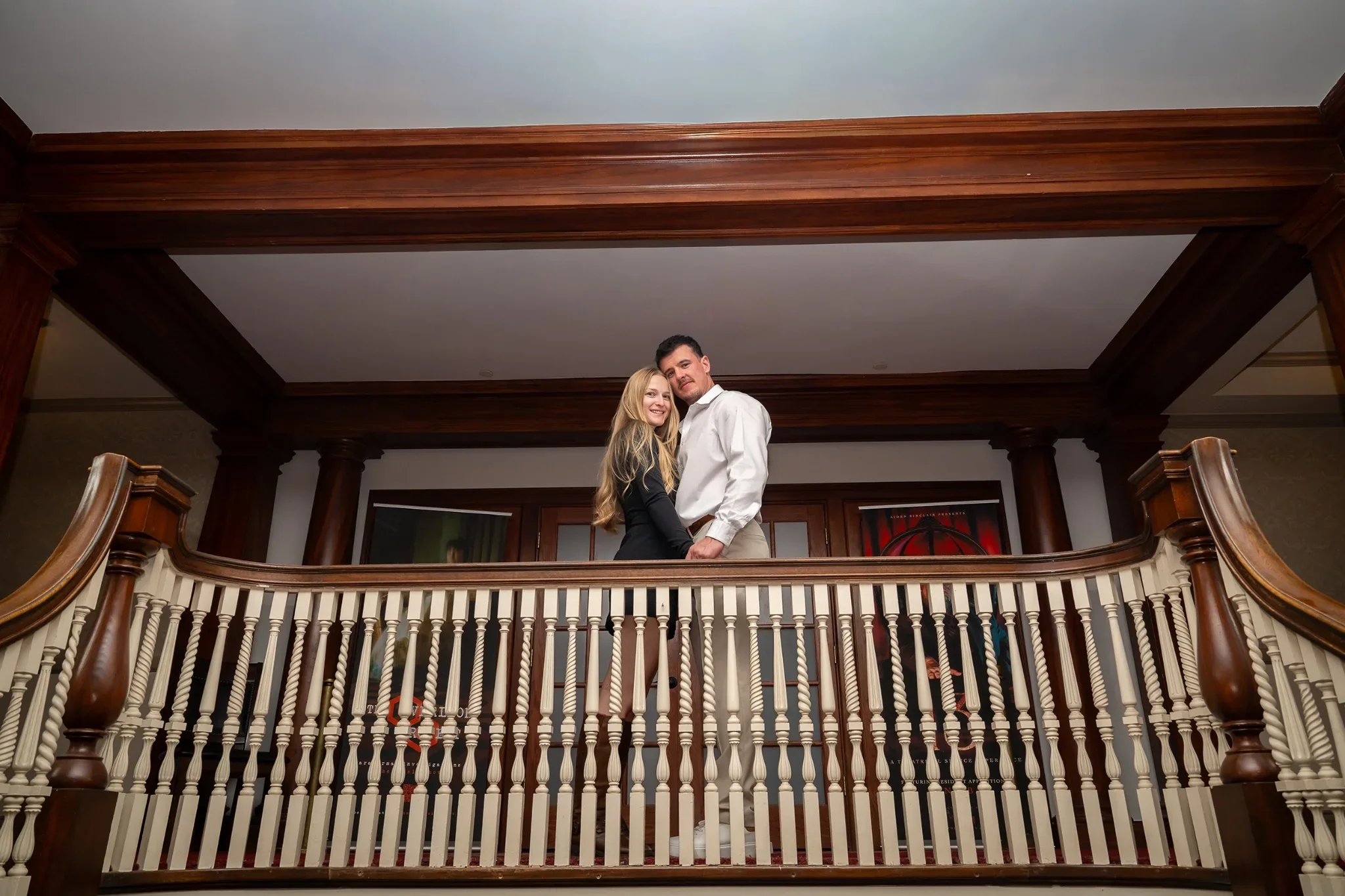 Engagement portrait inside the history Stanley Hotel in Estes Park captured by Ryan Kost.
