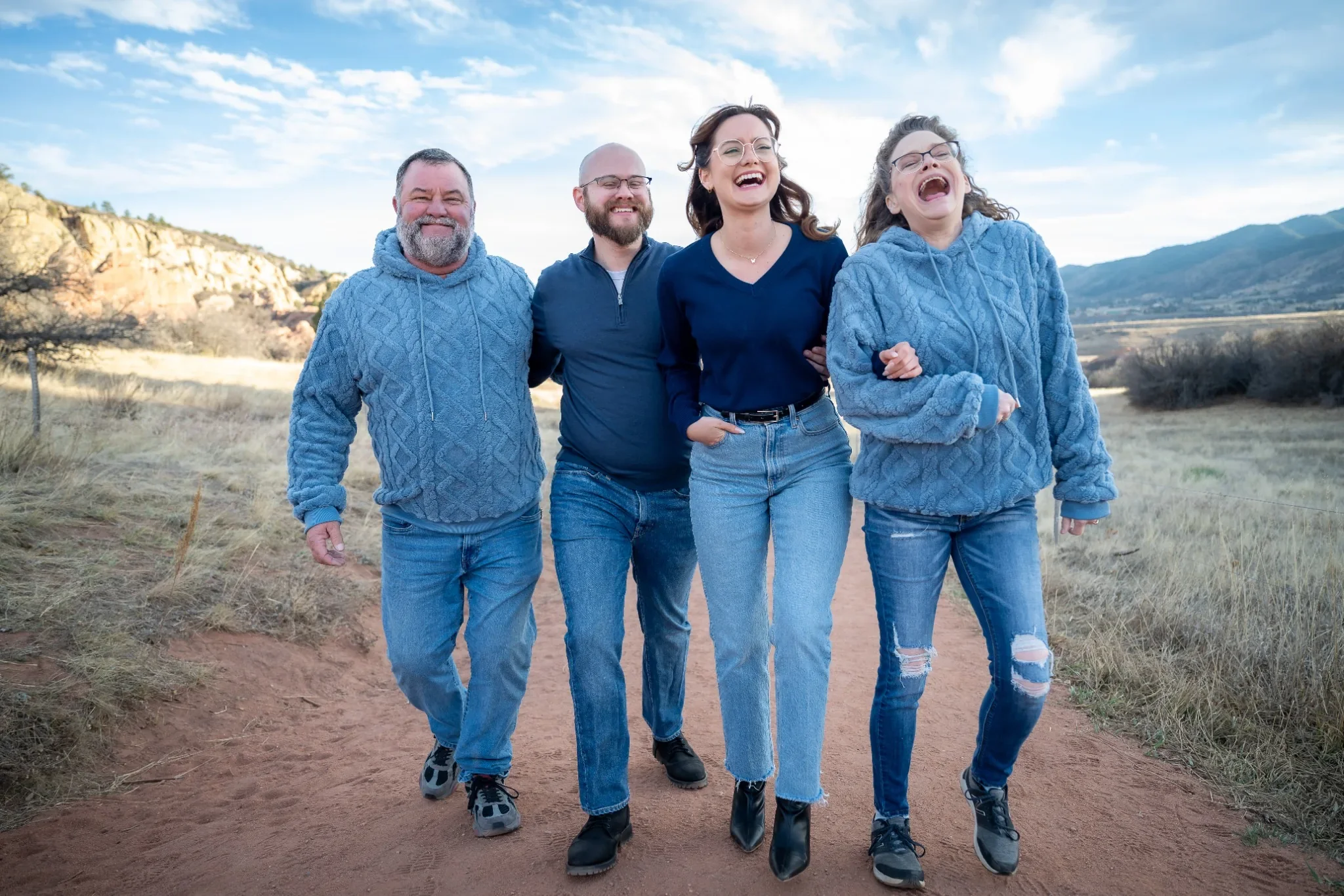 Joyful, natural family portrait at South Valley Park in Littleton, Colorado captured by Ryan Kost.