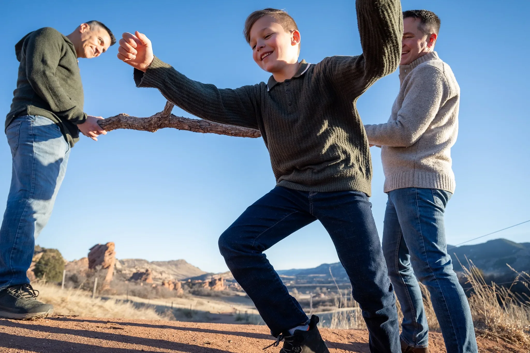 Limbo. Fun, relaxed outdoor family photography session at South Valley Park Littleton Colorado.