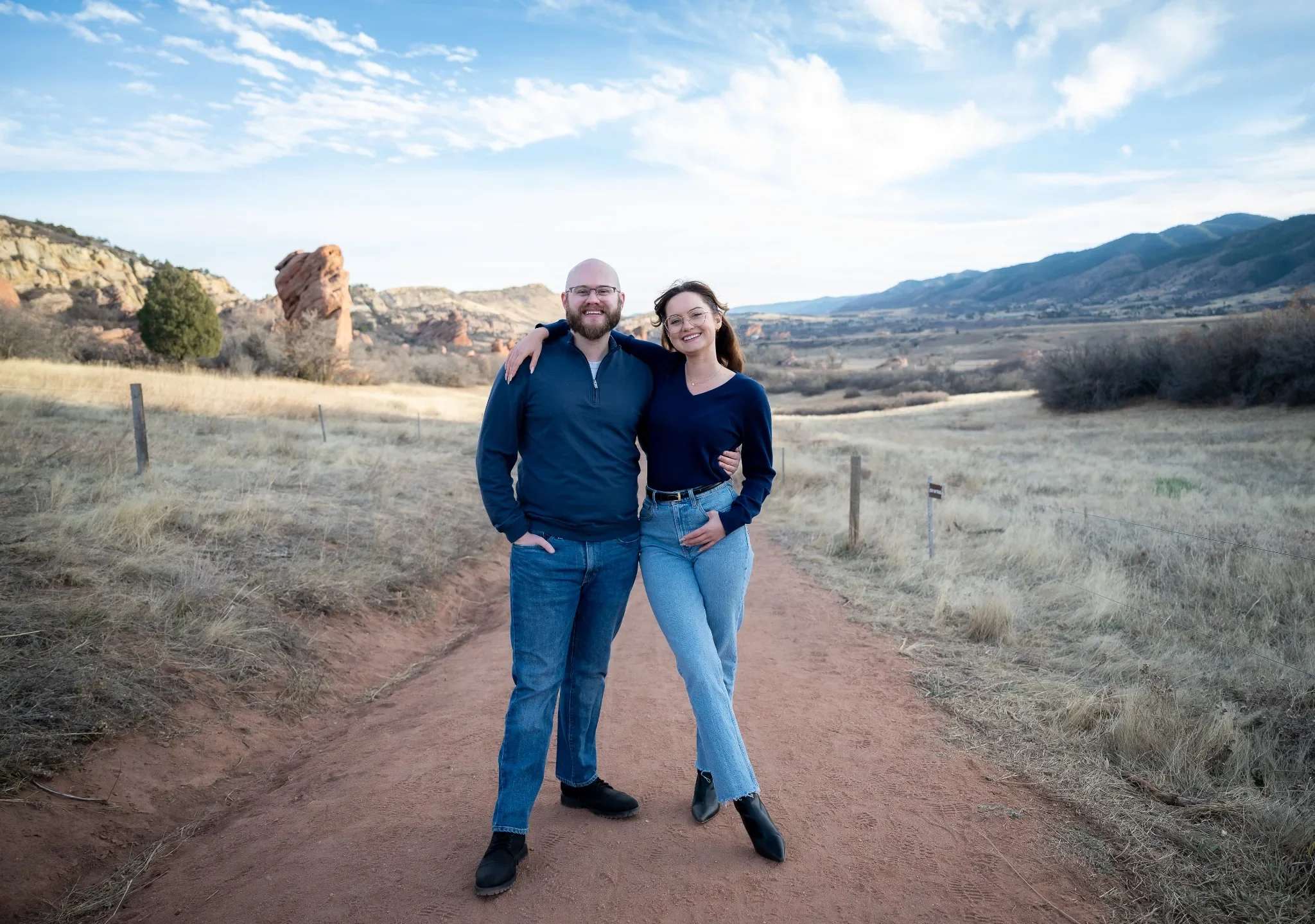 Twin siblings portraits on trail at South Valley Park in Littleton, Colorado during  winter family phot session captured by Ryan Kost