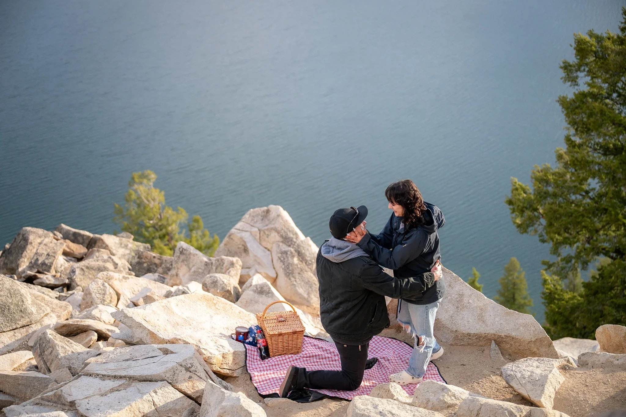 Surprise proposal at Sapphire Point overlooking Lake Dillon and the Colorado Rockies in Dillon, Colorado