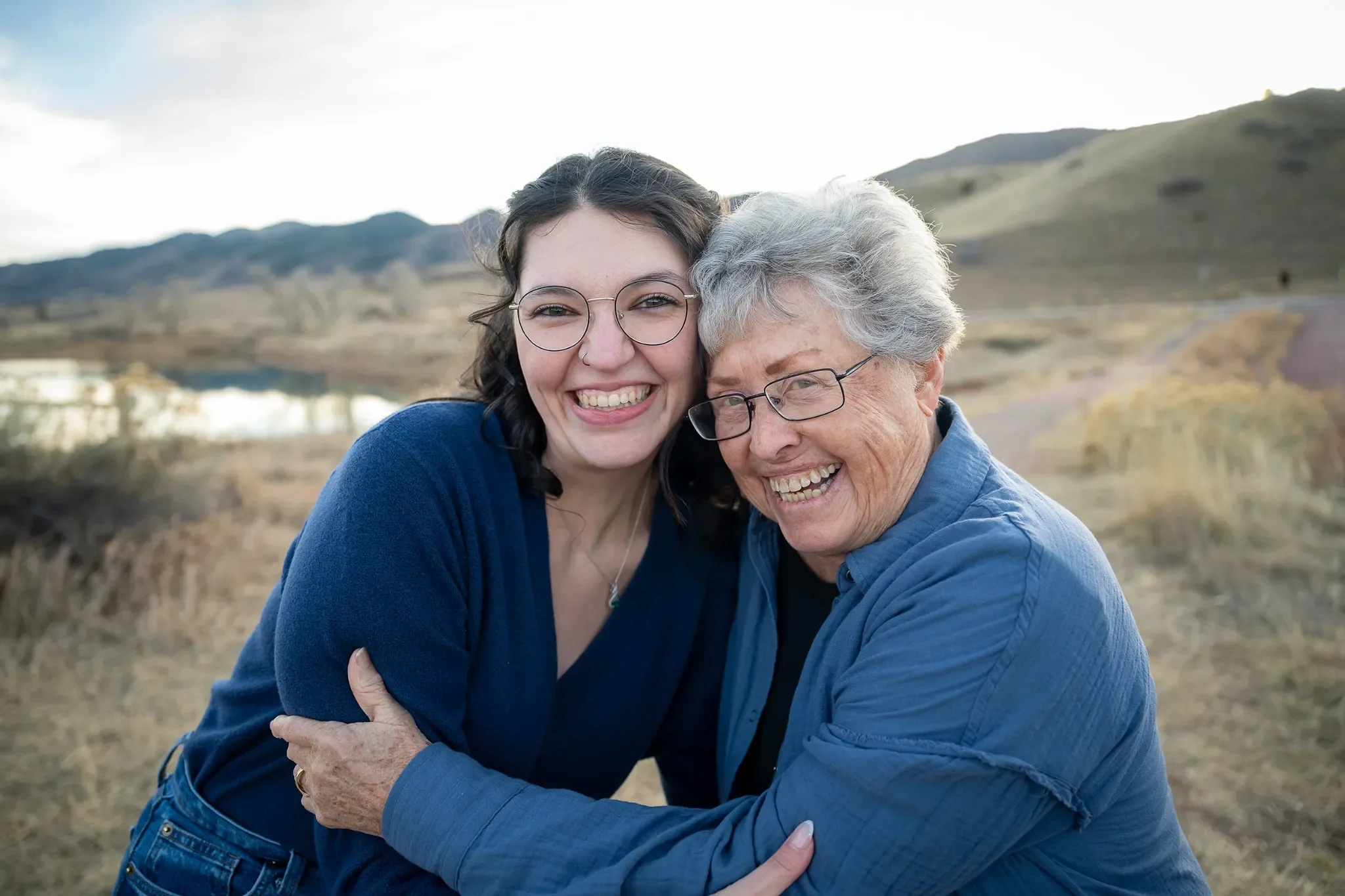 Grandmother celebrates with future granddaughter-in-law after she got engaged at South Valley Park in Littleton, Colorado.