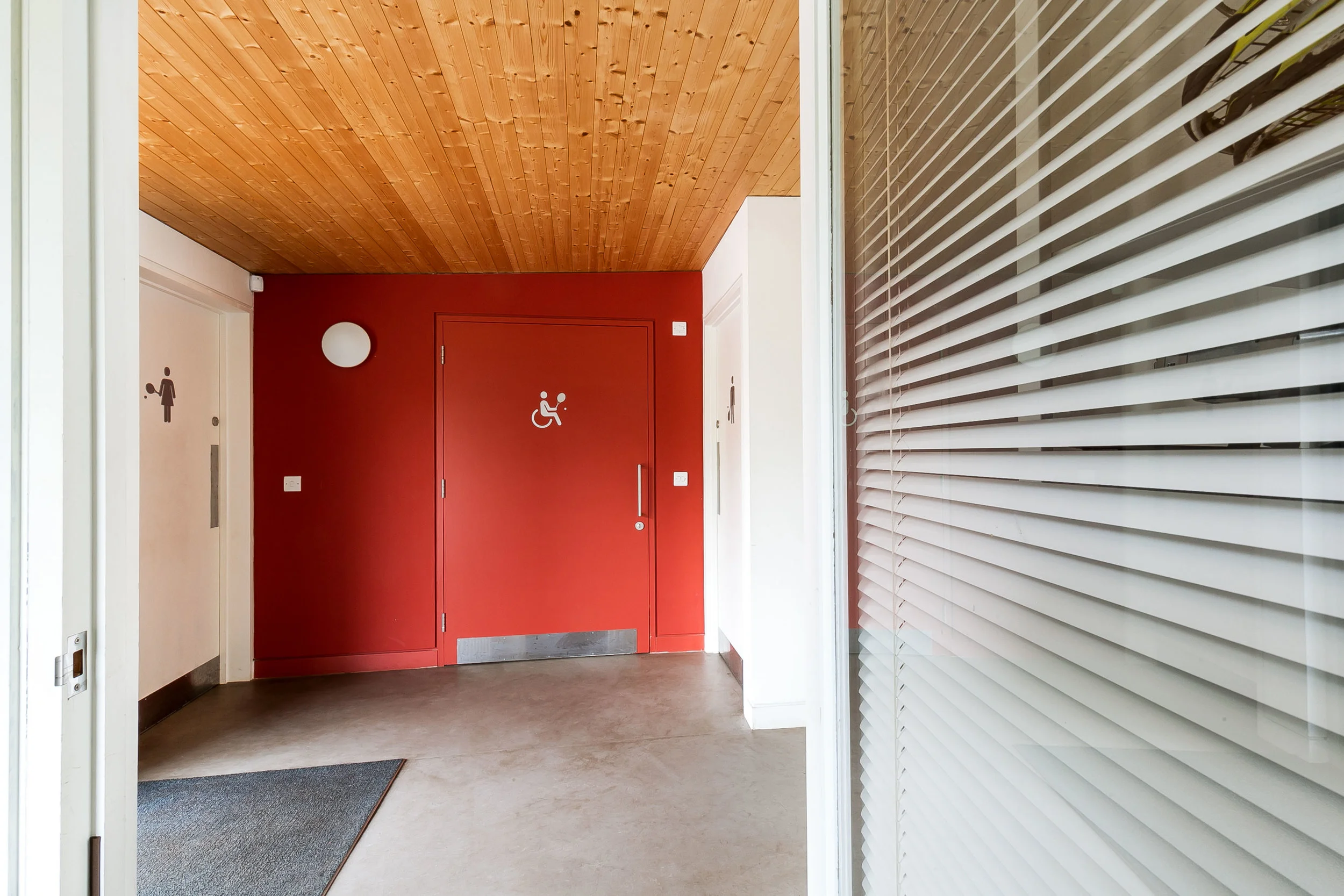 David Money Architects Dulwich Tennis Clubhouse interior entrance.jpg