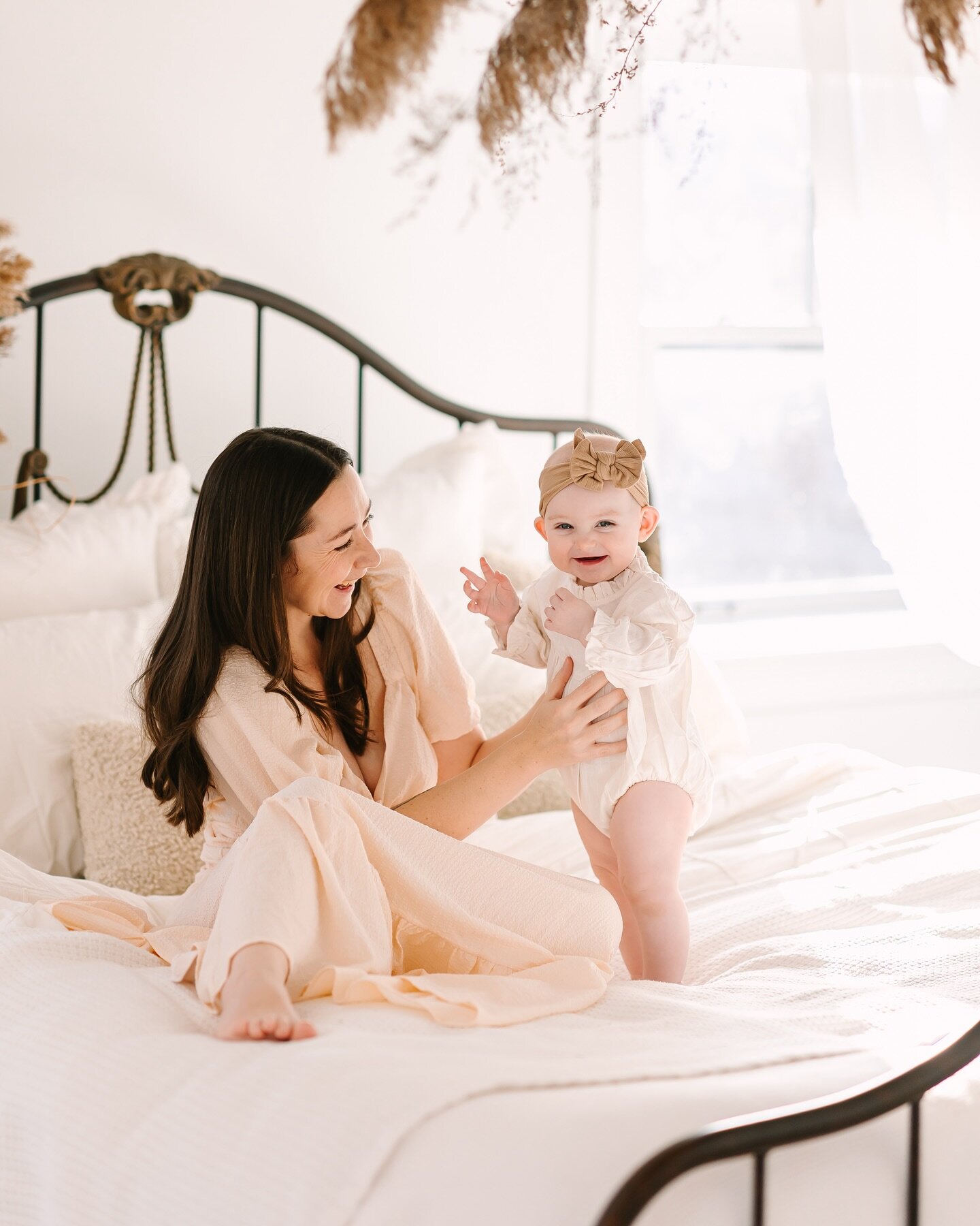 I last worked with this mama about a year ago in this very studio for some maternity photos when this sweet girl was in her belly.

It was so nice to see her again this weekend and meet this beautiful smiley girl for their intimate nursing session. 
