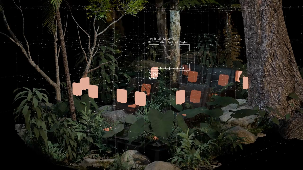 Overlay of digital grid and icons on a forest scene with trees and plants surrounding rocks.