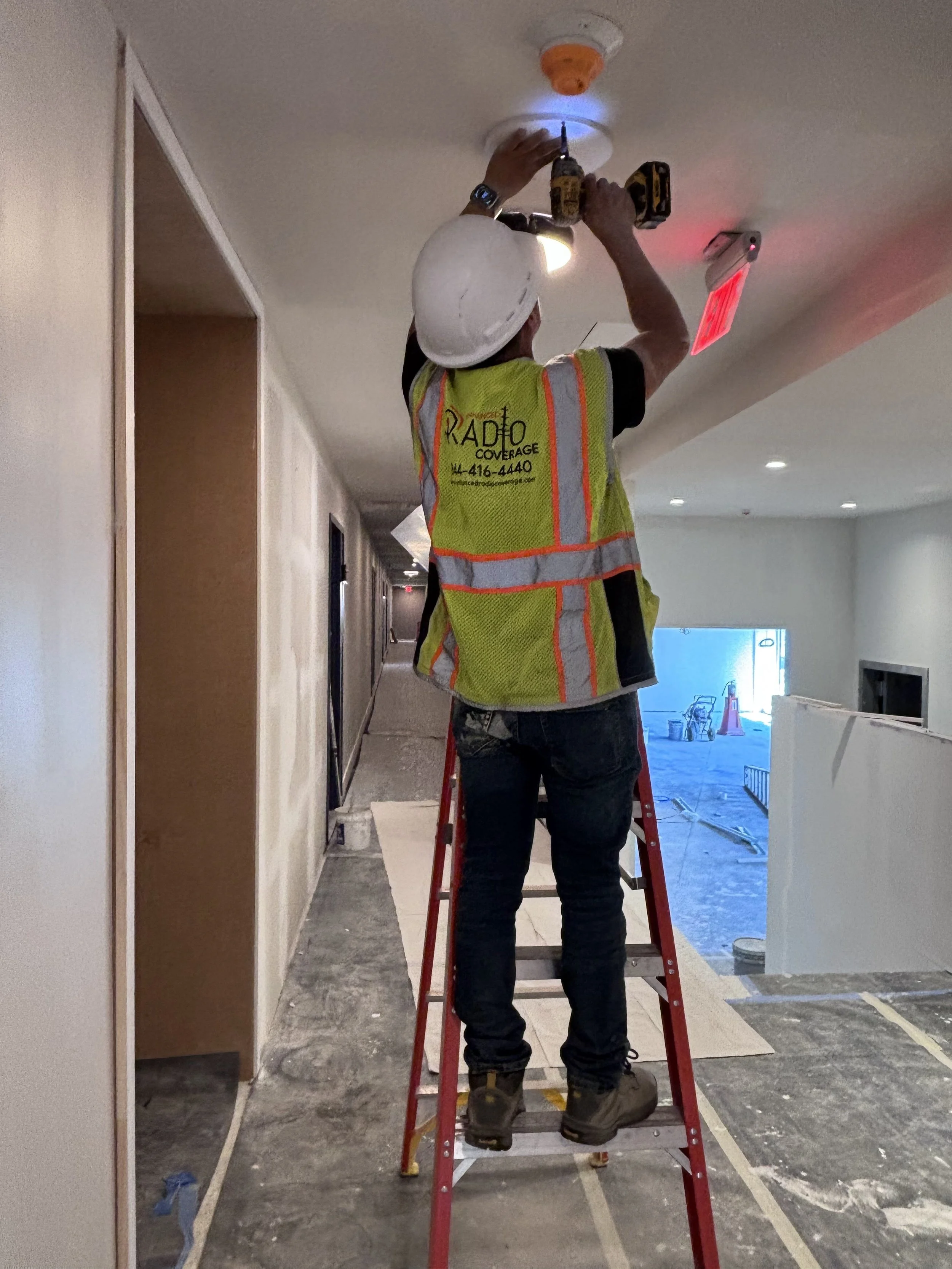 ERCES BDA System service antenna installation in multi family building by Enhanced Radio Coverage