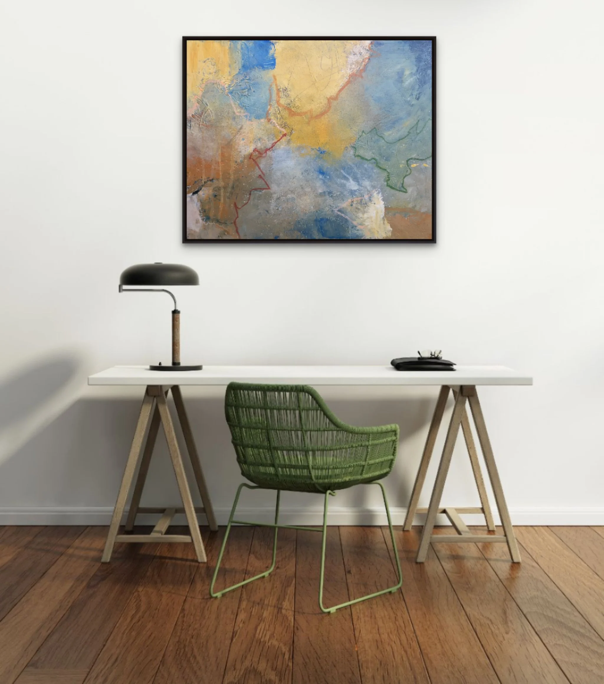 A minimalist office space with a white wall, a large abstract painting, a white desk, a black desk lamp, a black telephone, and a green wire chair.