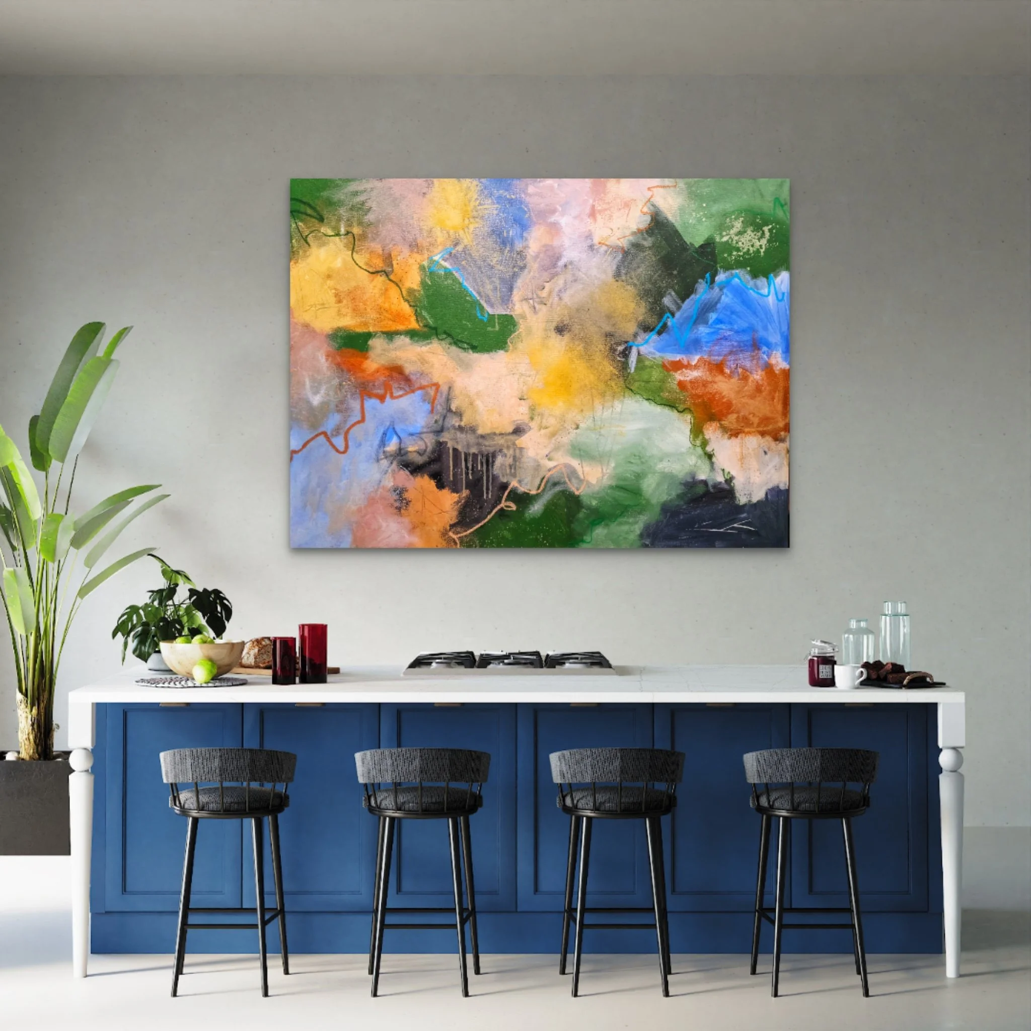 Modern kitchen with a white countertop, blue cabinets, and black bar stools. Artistic painting hangs on a gray wall above the counter. Small potted plants, glasses, and jars are arranged on the countertop.