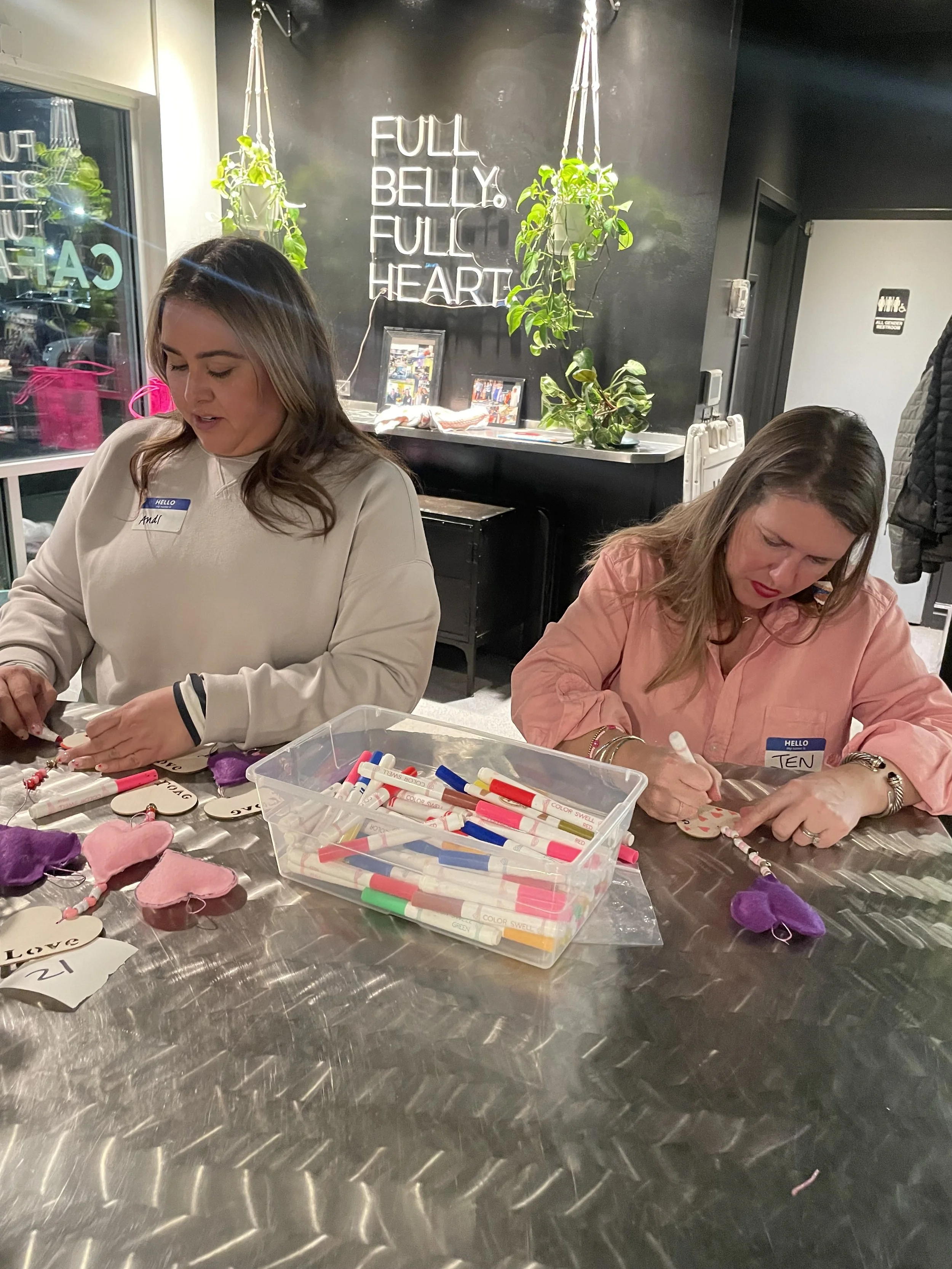 ZAG Project Volunteers writing hand written notes