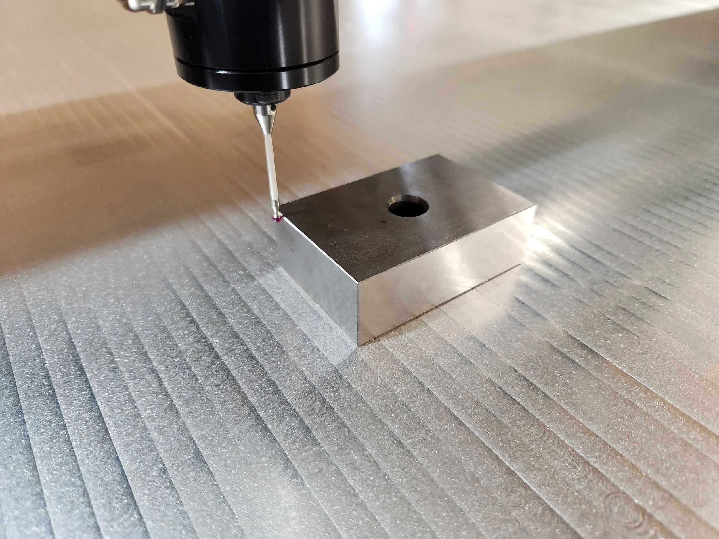 Probe-based inspection setup on for precision metal part verification in Columbus, Wisconsin