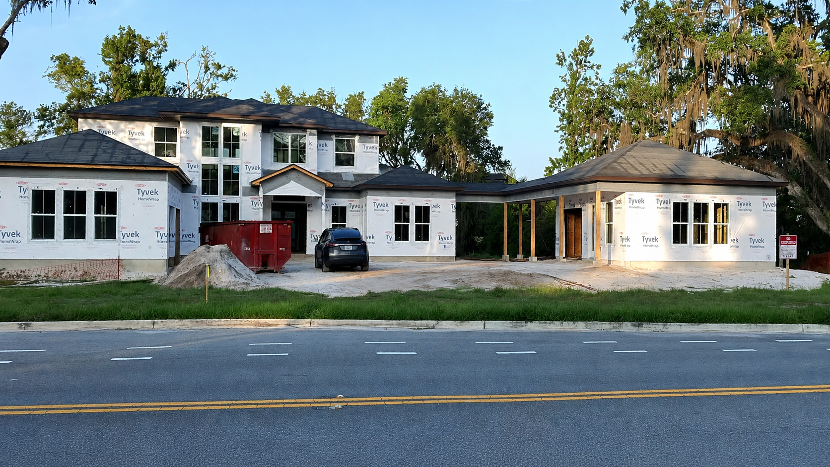 Windows, weatherproofing, and roofing are underway as this custom home off State Road 16 near SilverLeaf in St. Augustine, Florida, moves closer to completion. Elite Construction of JAX serves custom home clients throughout St. Augustine, Jacksonvill