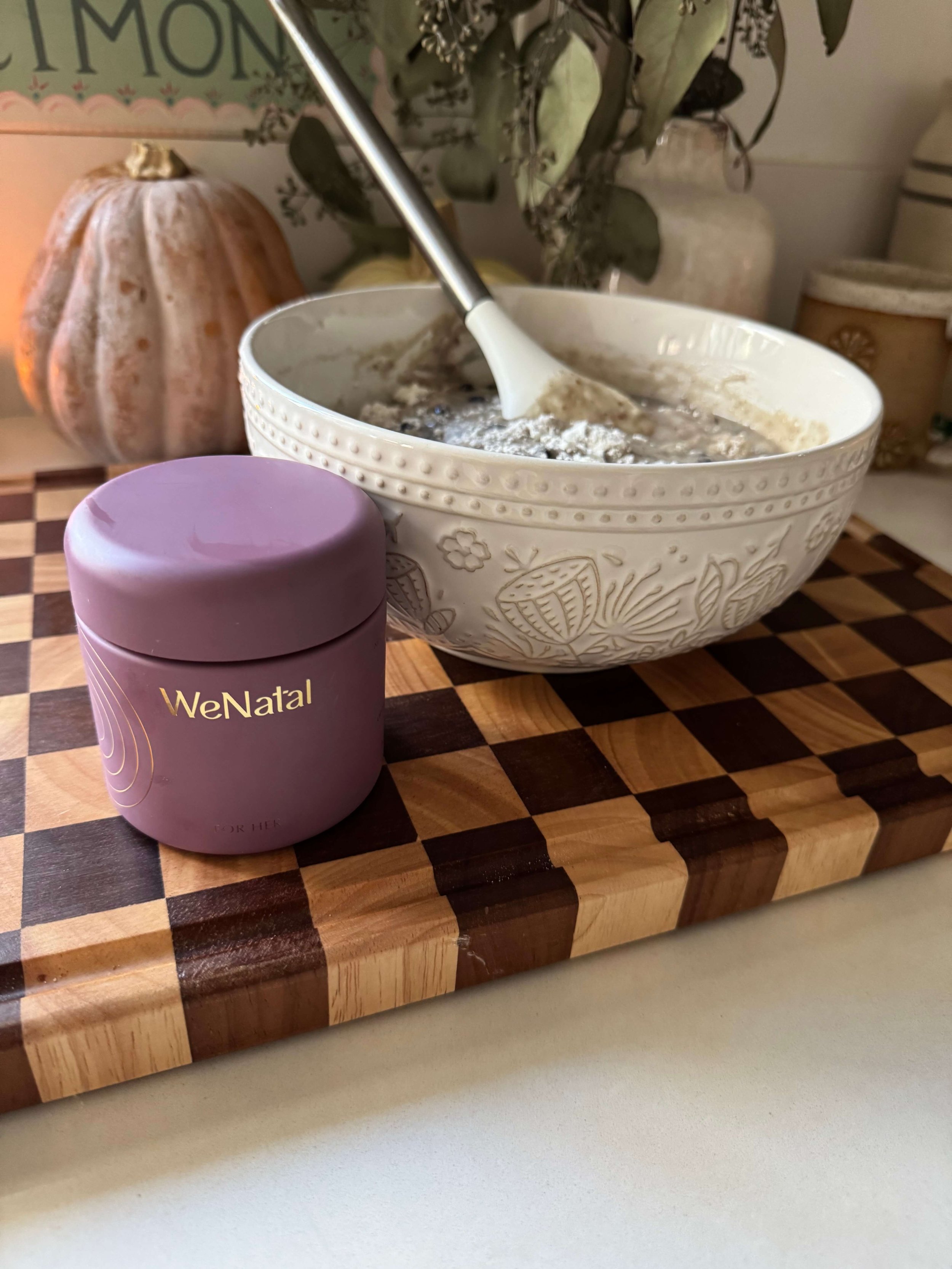 wenatal supplements infant of muffins in muffin pan by candle light in kitchen muffin dough in bowl