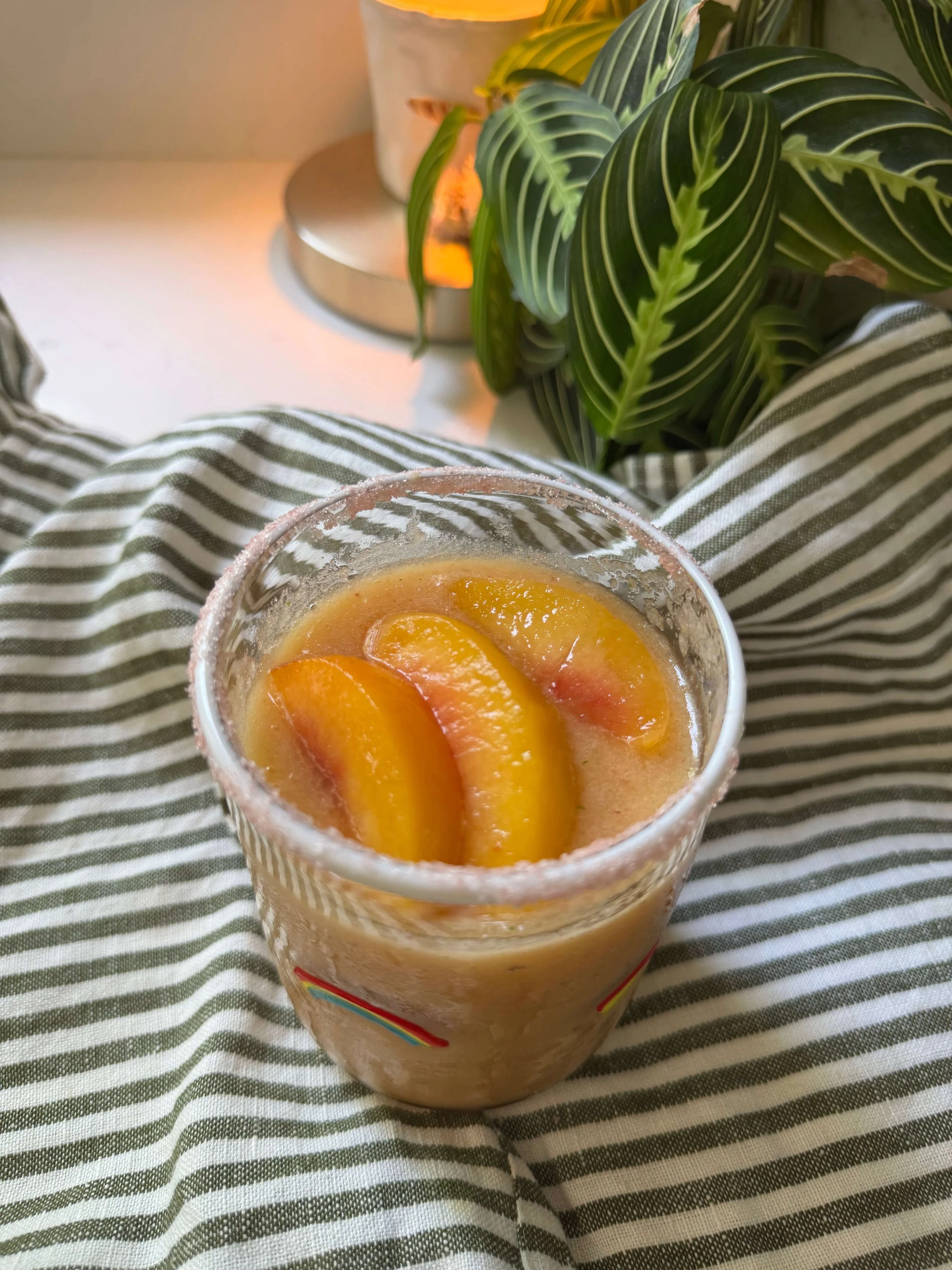 Peach Mint Sea Salt Labor Aid in glass cup
