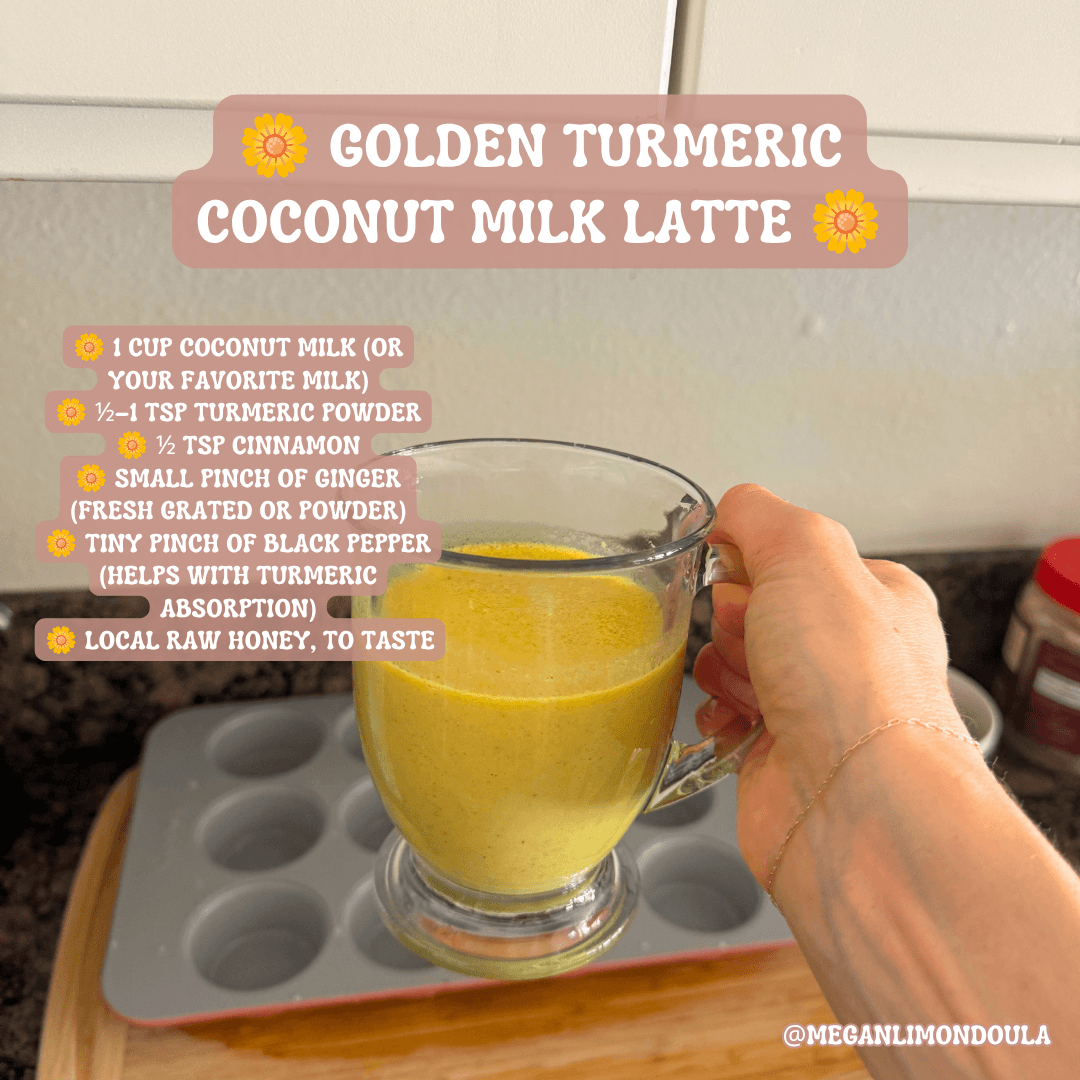 golden turmeric coconut milk latte in glass mug holding hand