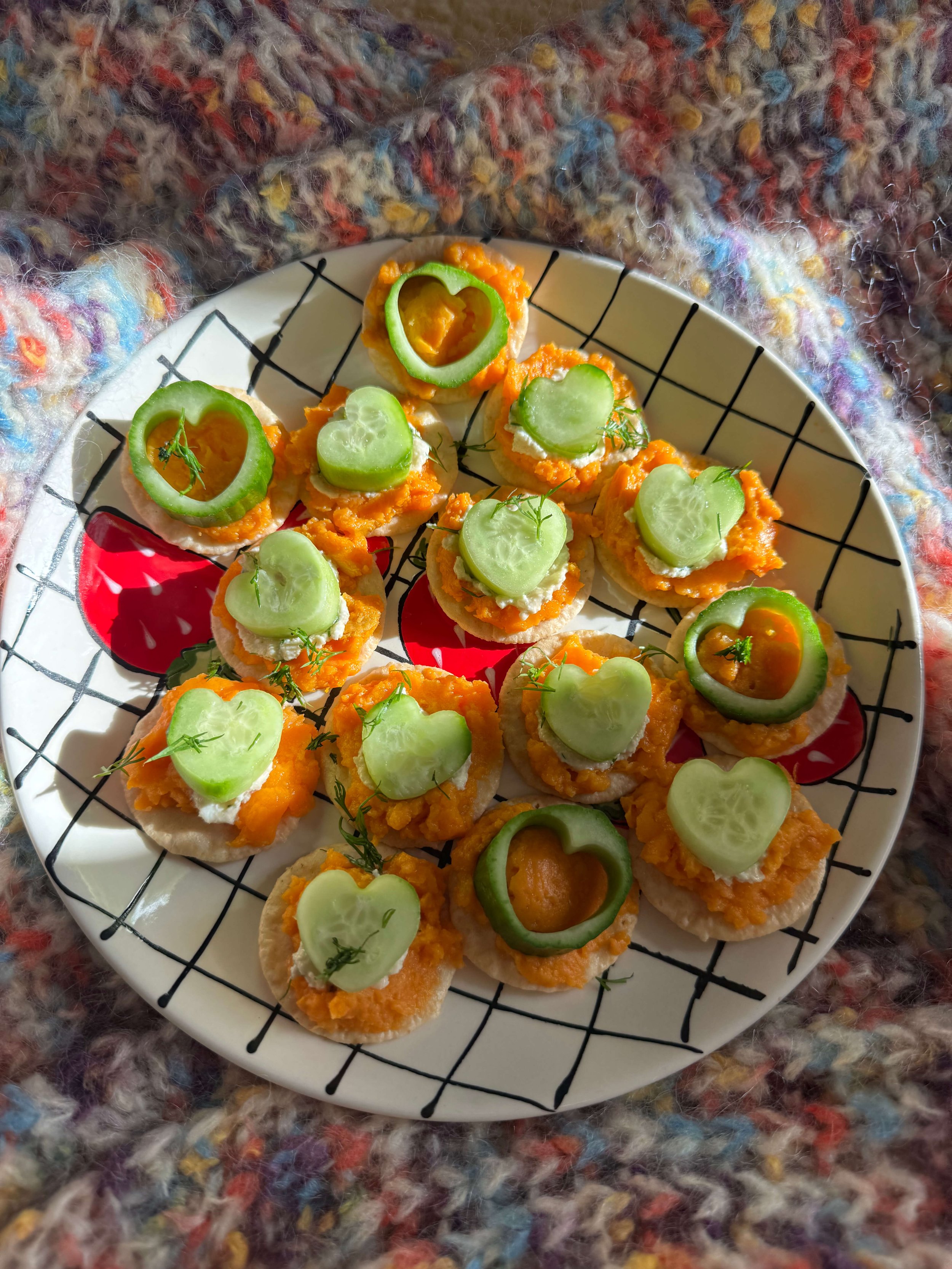 Sweet Potato Spread & Cucumber Heart Crackers on plate colorful