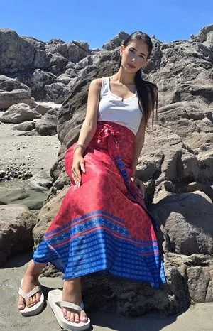Island-inspired DONBERNAE wrap skirt styled on a tropical beach
