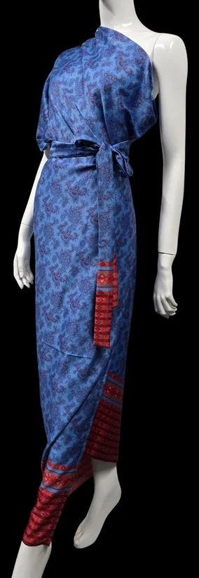 Blue kimono-style DONBERNAE wrap featuring tropical red island accents