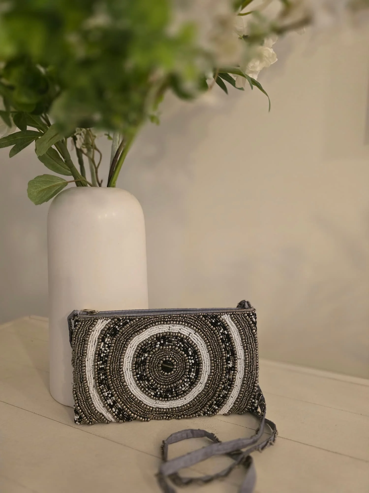 Grey and white circle purse with strap 1.jpg