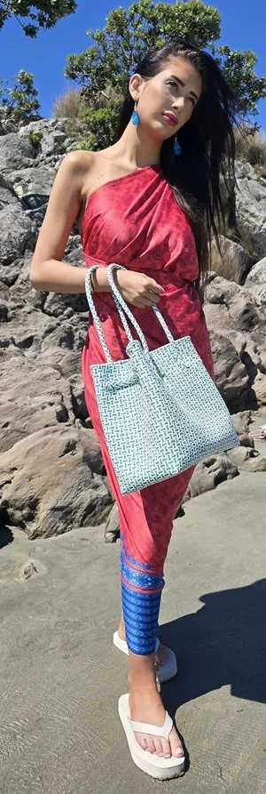 Elegant pink DONBERNAE beach dress styled for tropical island living
