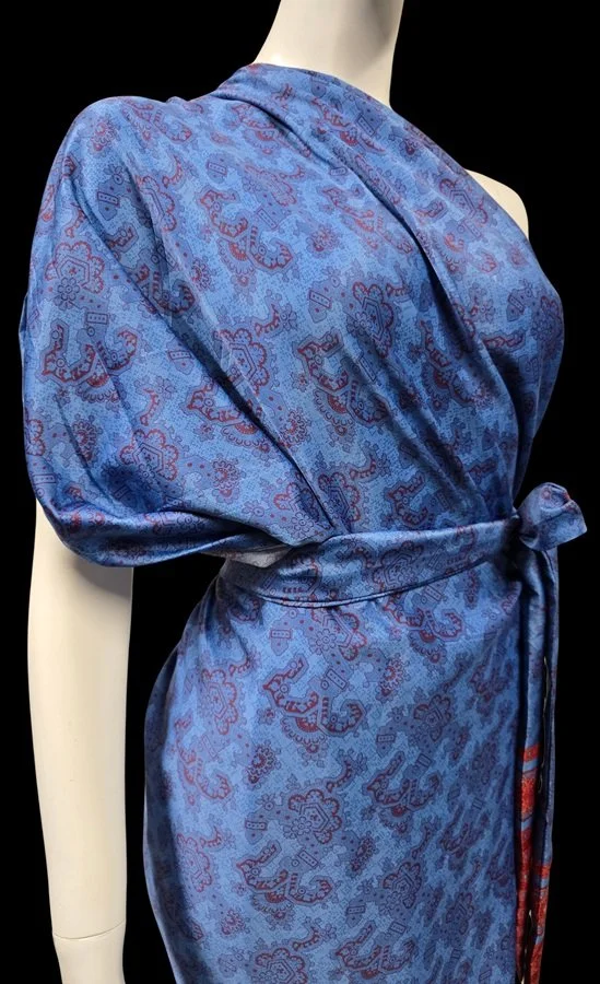 Blue tropical sarong dress with red paisley and floral island-inspired print