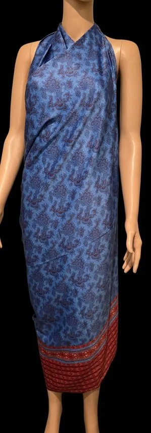 Blue and red DONBERNAE resort dress inspired by island fashion traditions
