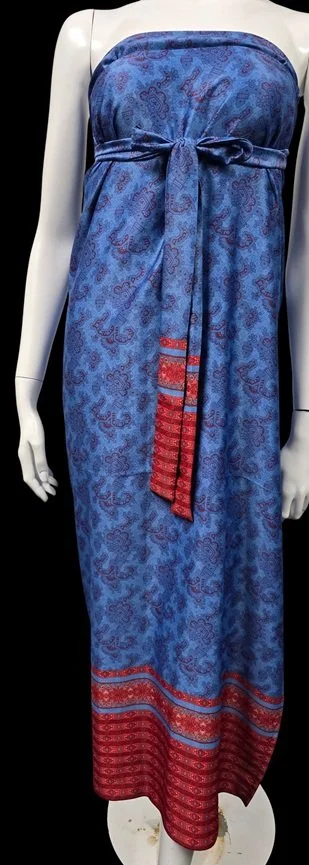 Strapless blue DONBERNAE dress with elegant tropical resort styling
