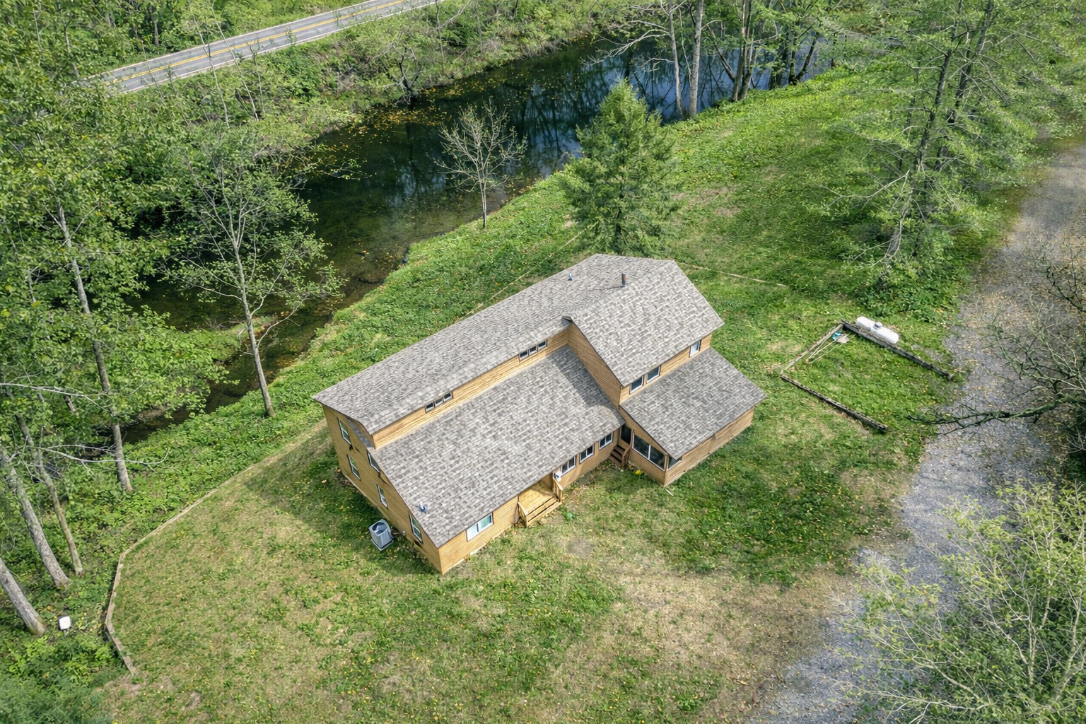 House arial front + creek.png