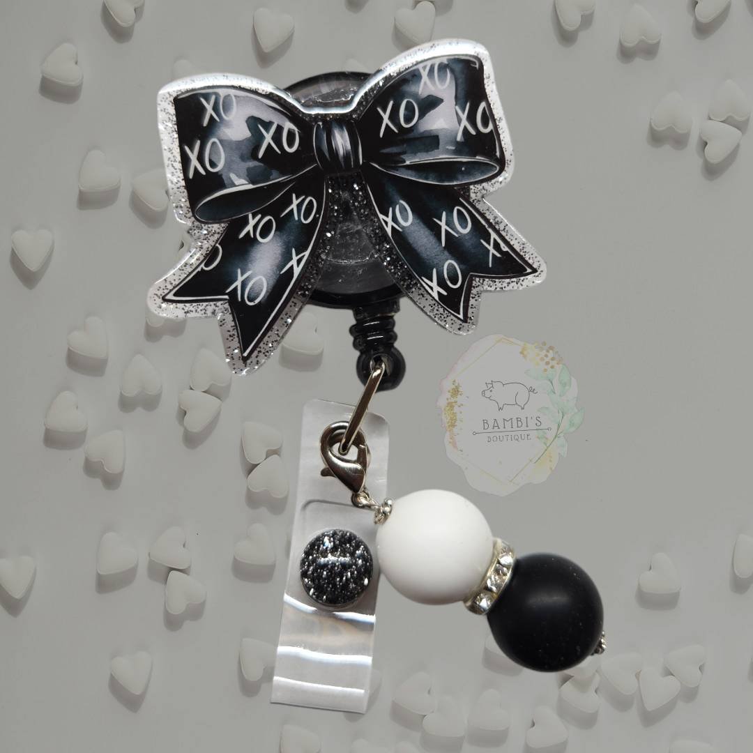 XOXO Bow Badge Reel
