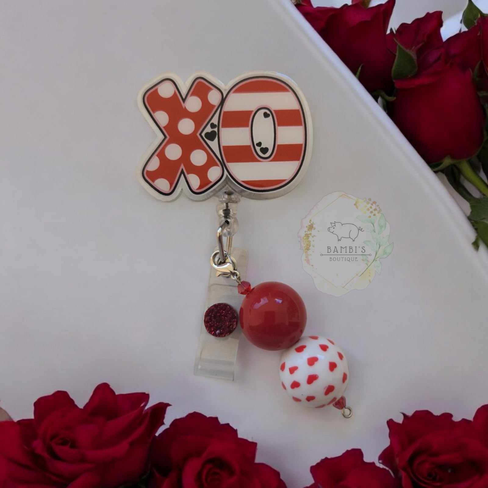 XOXO Badge Reel