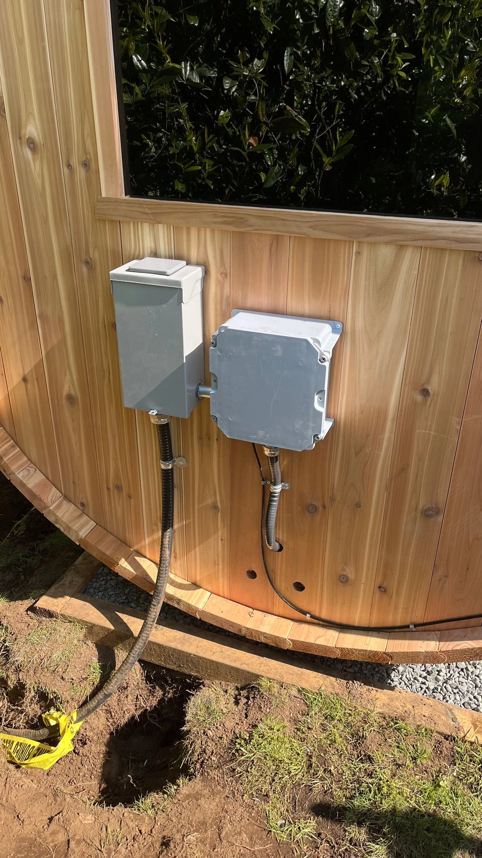 Completed outdoor sauna with a weatherproof disconnect installed