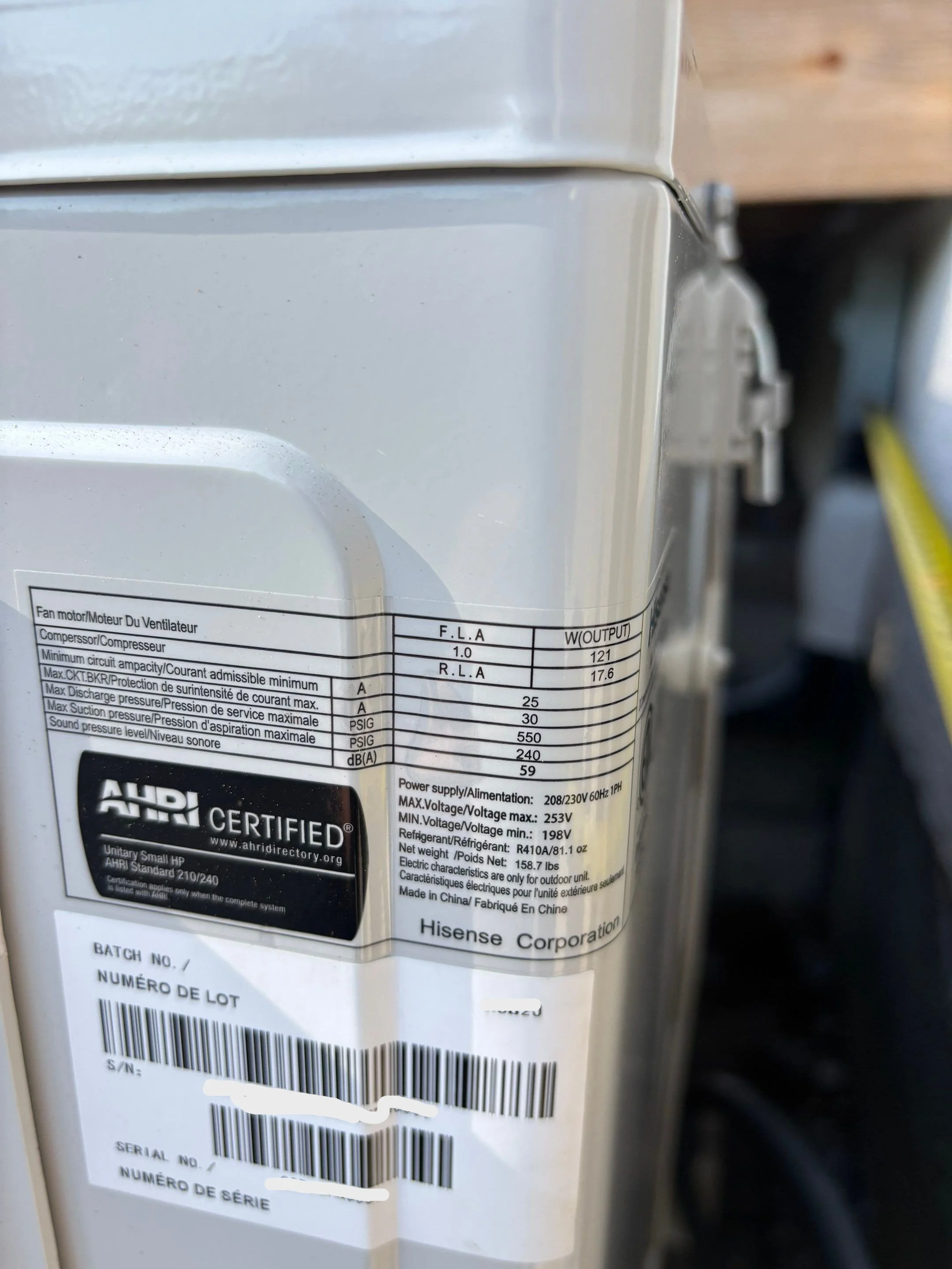 heat pump nameplate showing 30 amp maximum breaker and 240 volt power supply