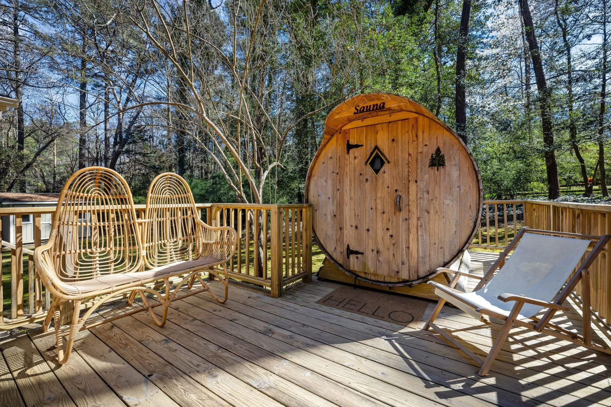 Outdoor cedar sauna after electrical installation