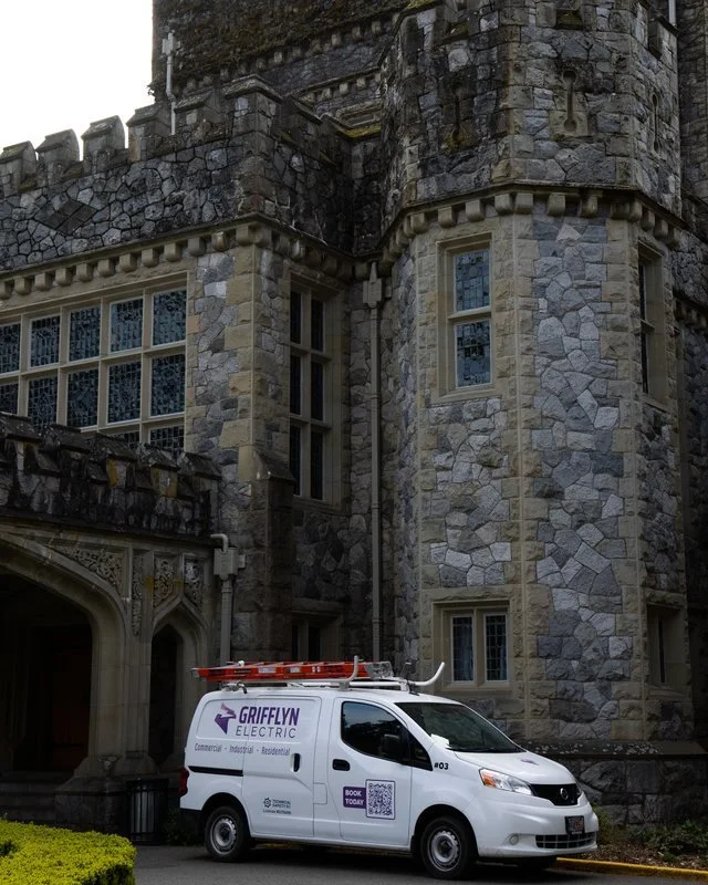 Grifflyn Electric service van parked outside Hatley Castle at Royal Roads University