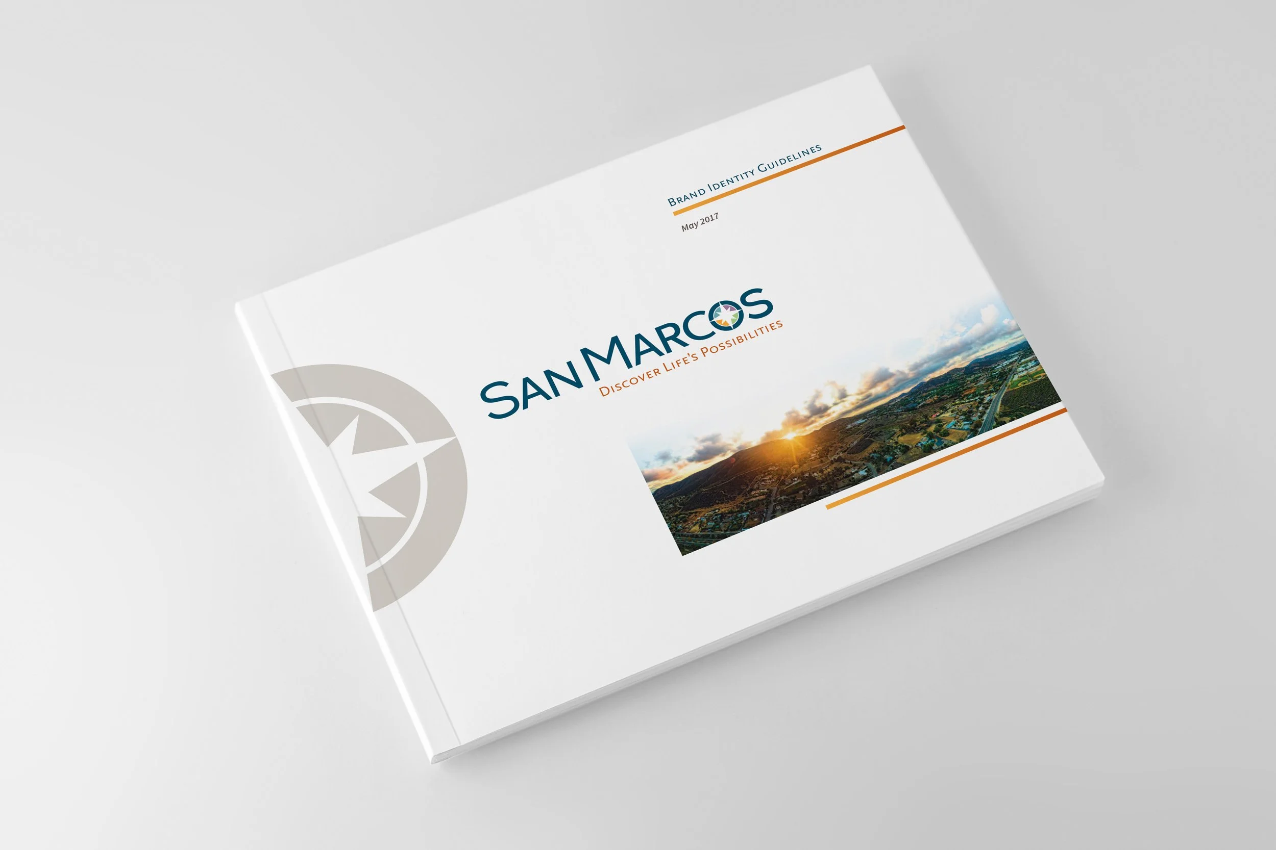 City of San Marcos new logo on book