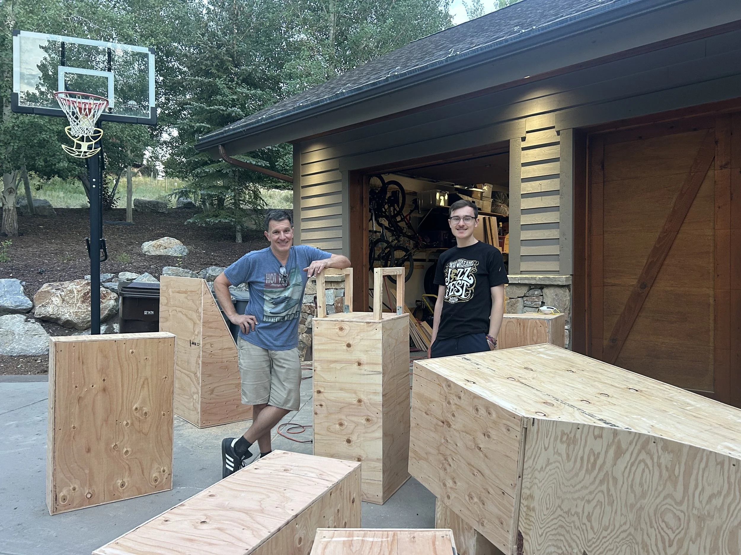 Greg & Bash Toth smile after several days of intense carpentry work.